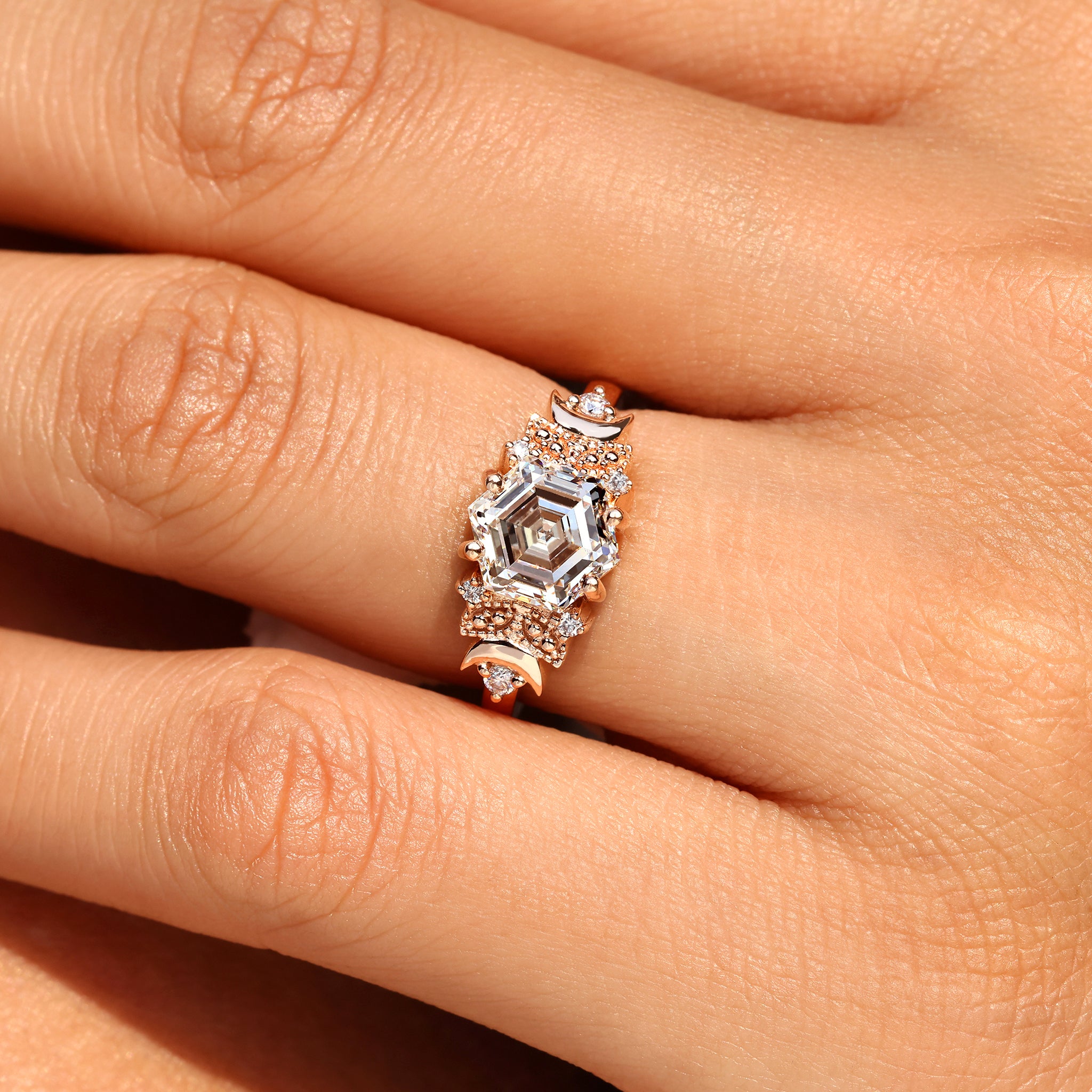 Carat Diamonds hexagon step cut diamond ring.
