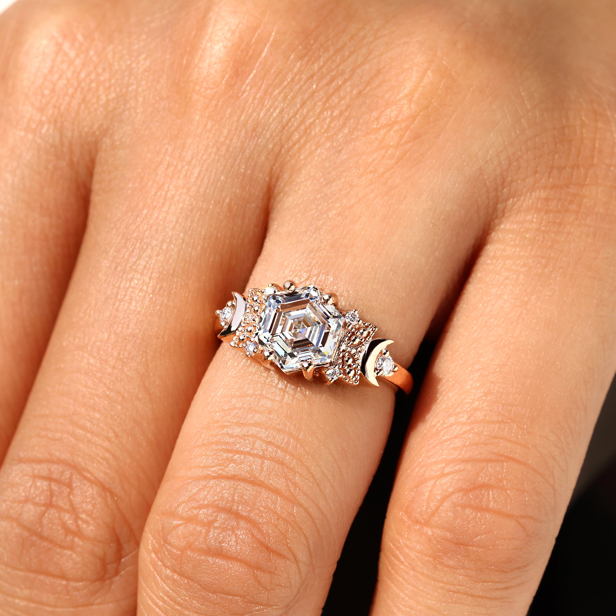 Vintage diamond engagement ring with hexagon step cut diamond.
