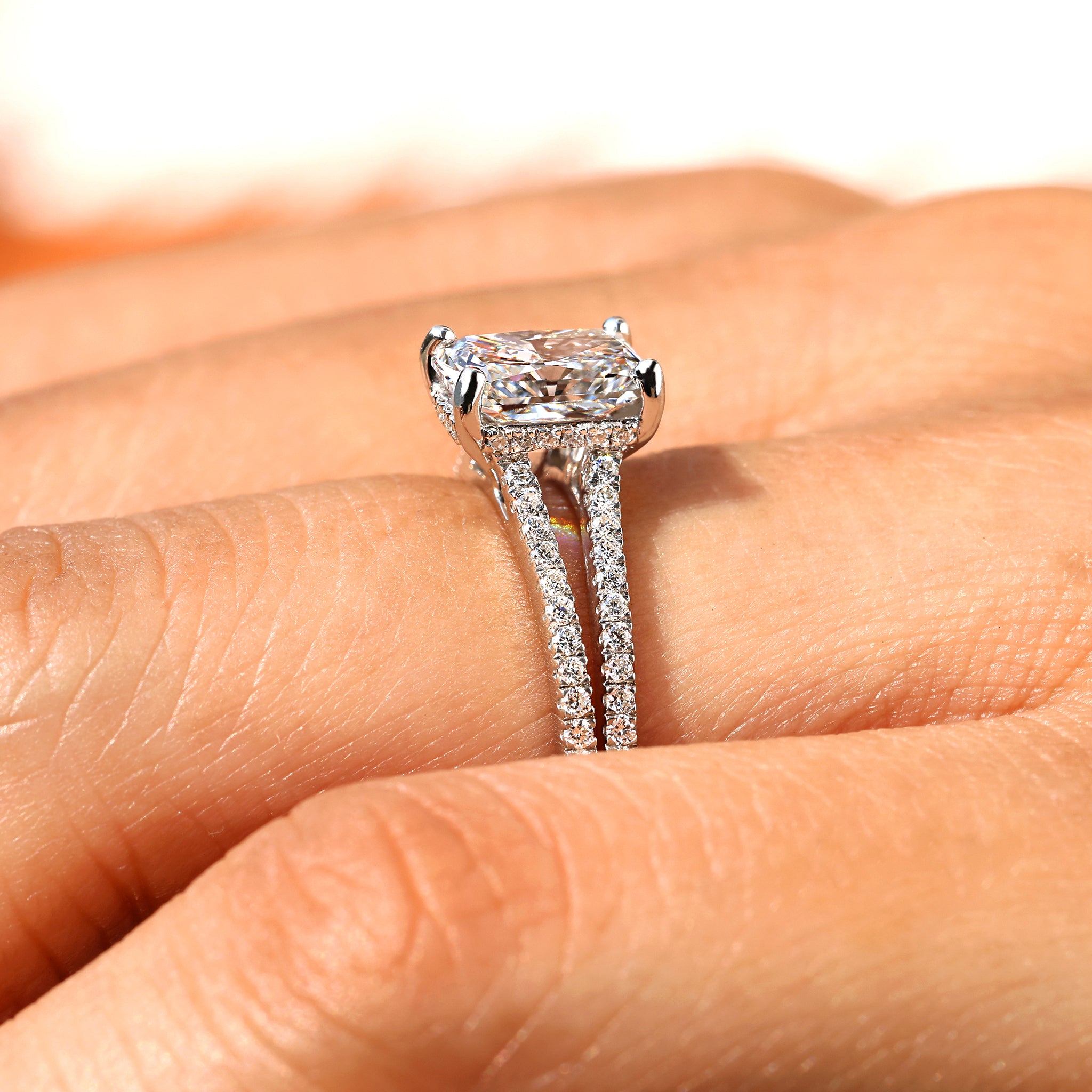 Handmade radiant cut diamond engagement ring.
