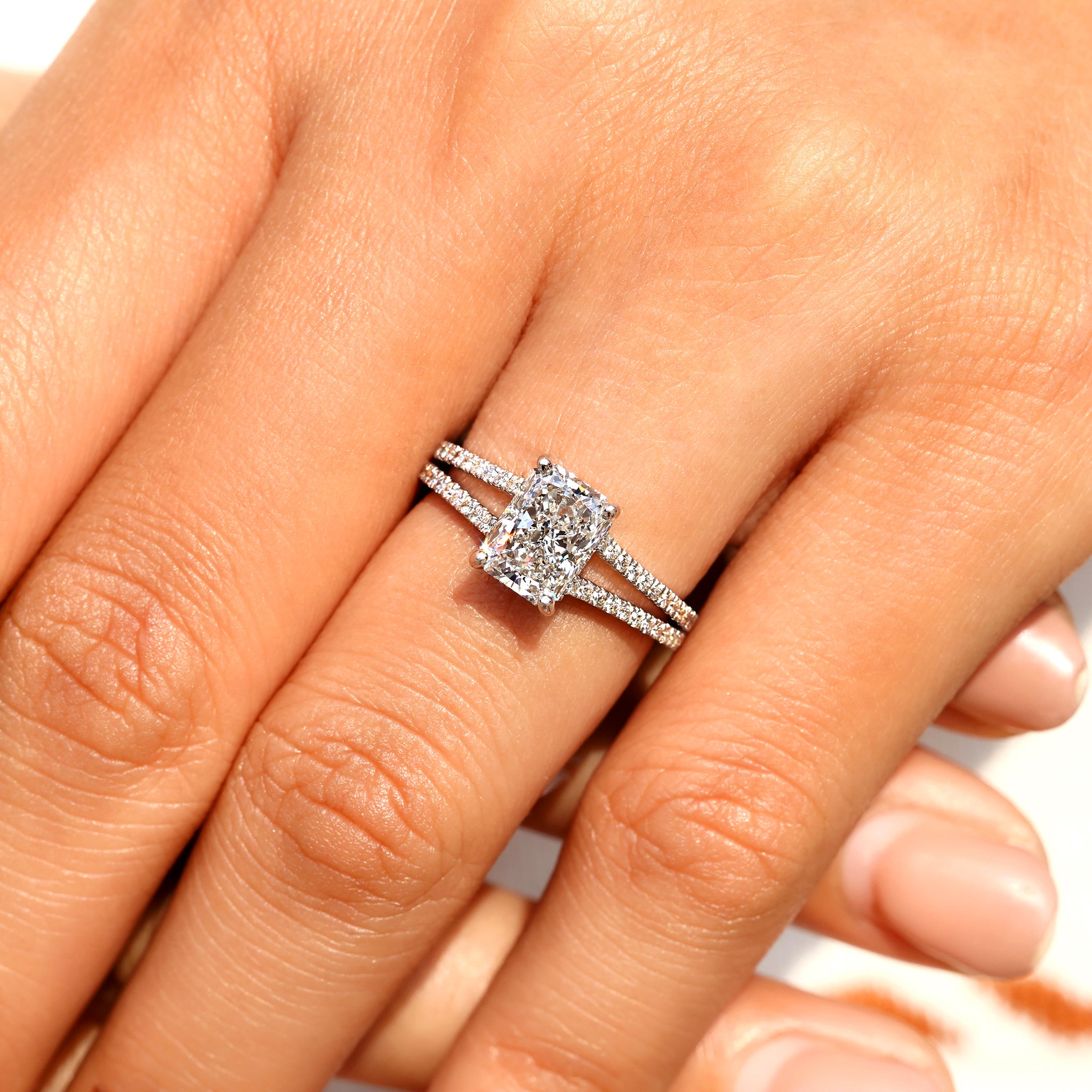 Lab grown radiant cut diamond engagement ring.
