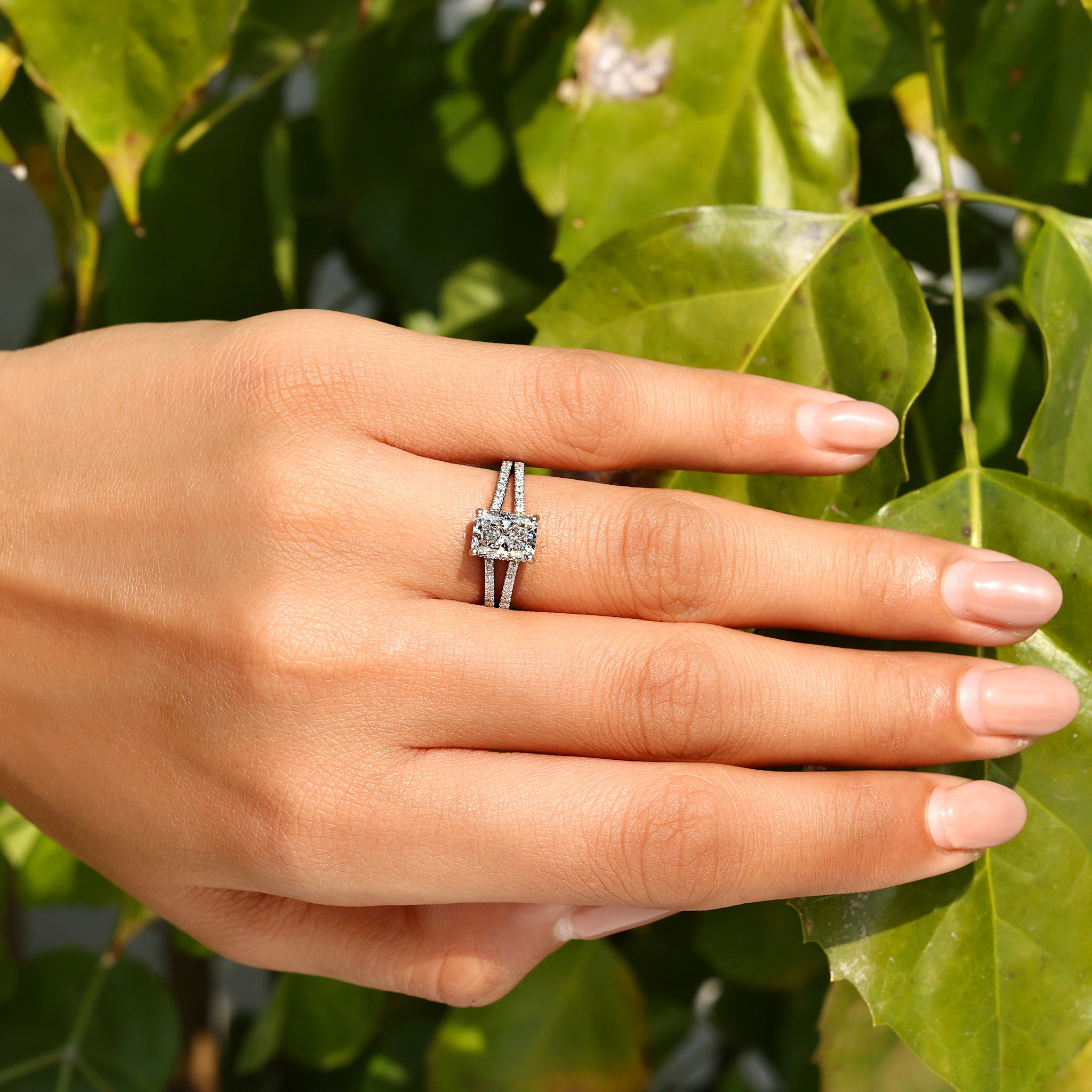 Cathedral setting radiant cut diamond ring.
