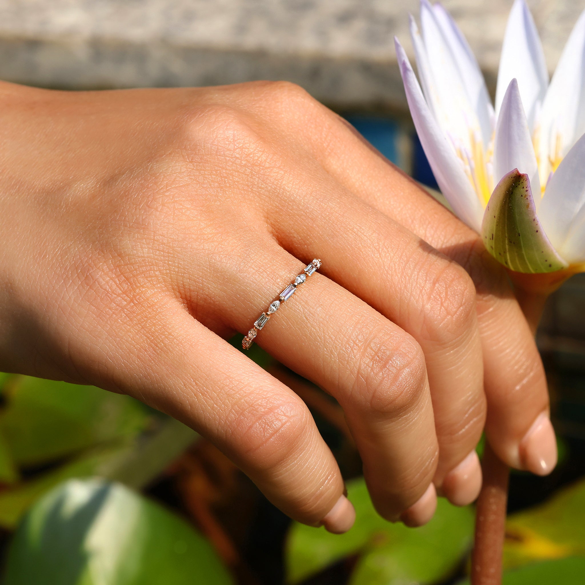 Full eternity diamond band with marquise and baguette cuts.
