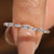 Diamond eternity band with marquise and baguette diamonds.
