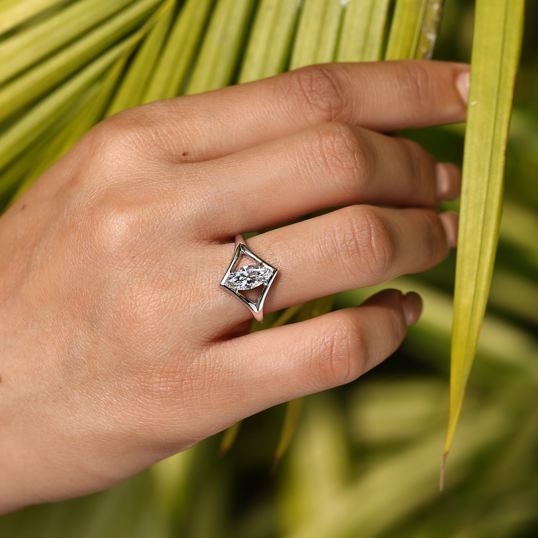 IGI certified marquise diamond ring with claw prongs.
