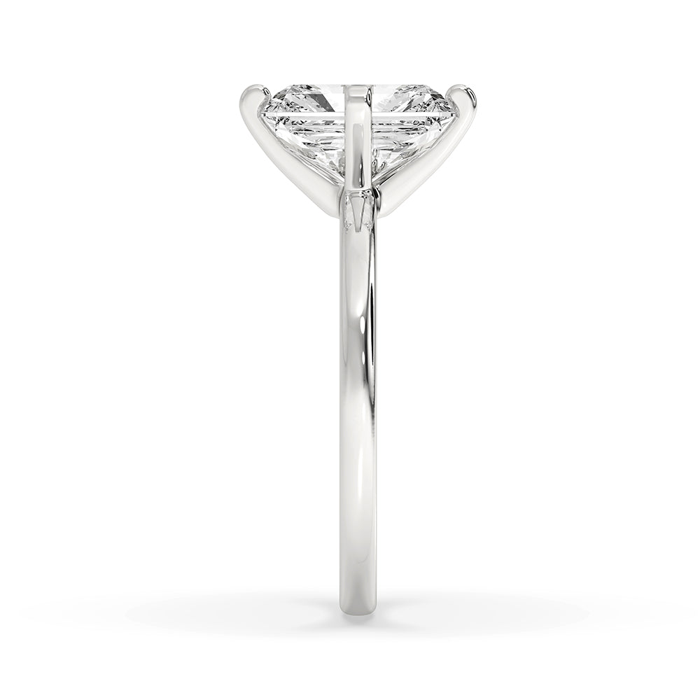 White gold ring featuring a prong setting.