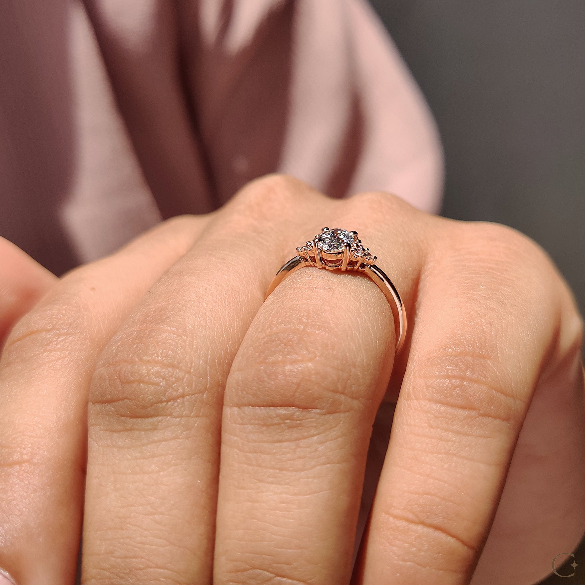 Tapered shank ring with lab grown diamond center.

