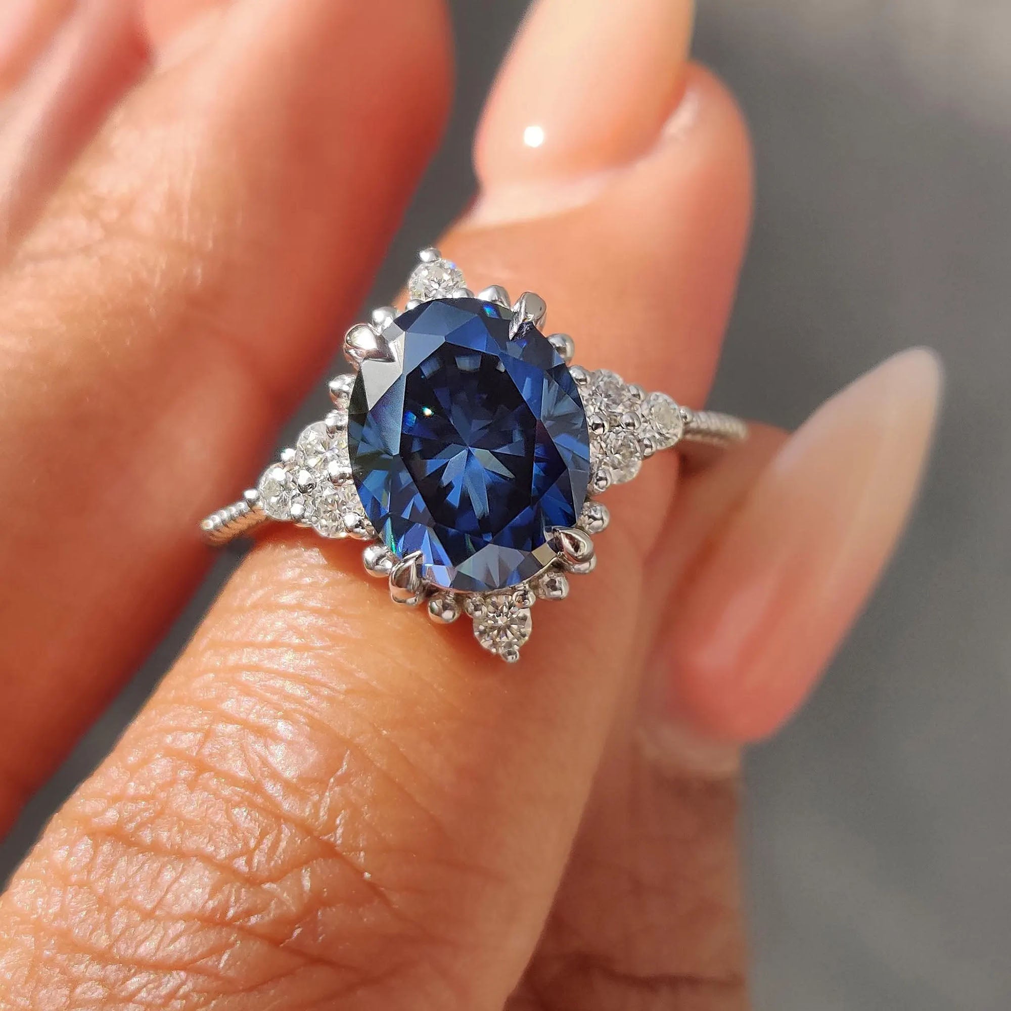 Muse ring combines creativity with bold symmetry in design.
