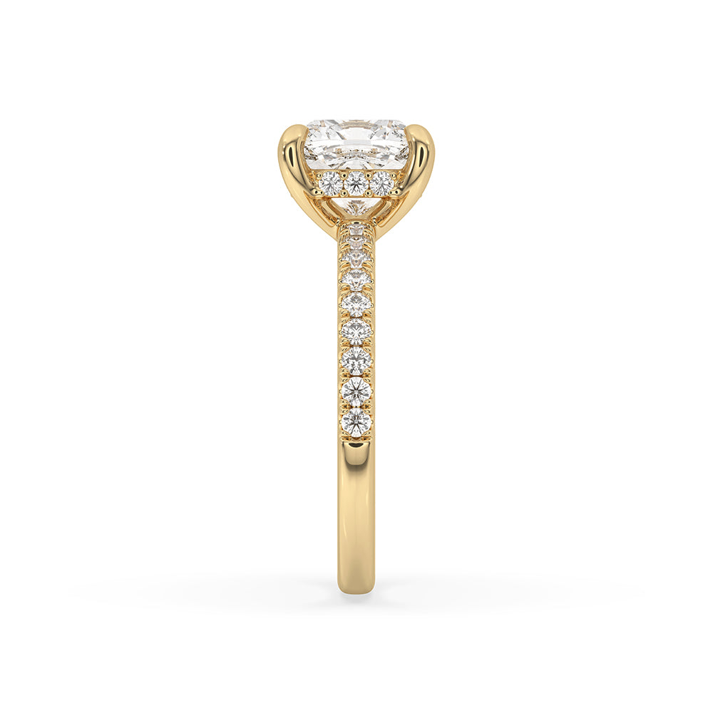 Lab grown diamond cushion cut ring in a pave setting.
