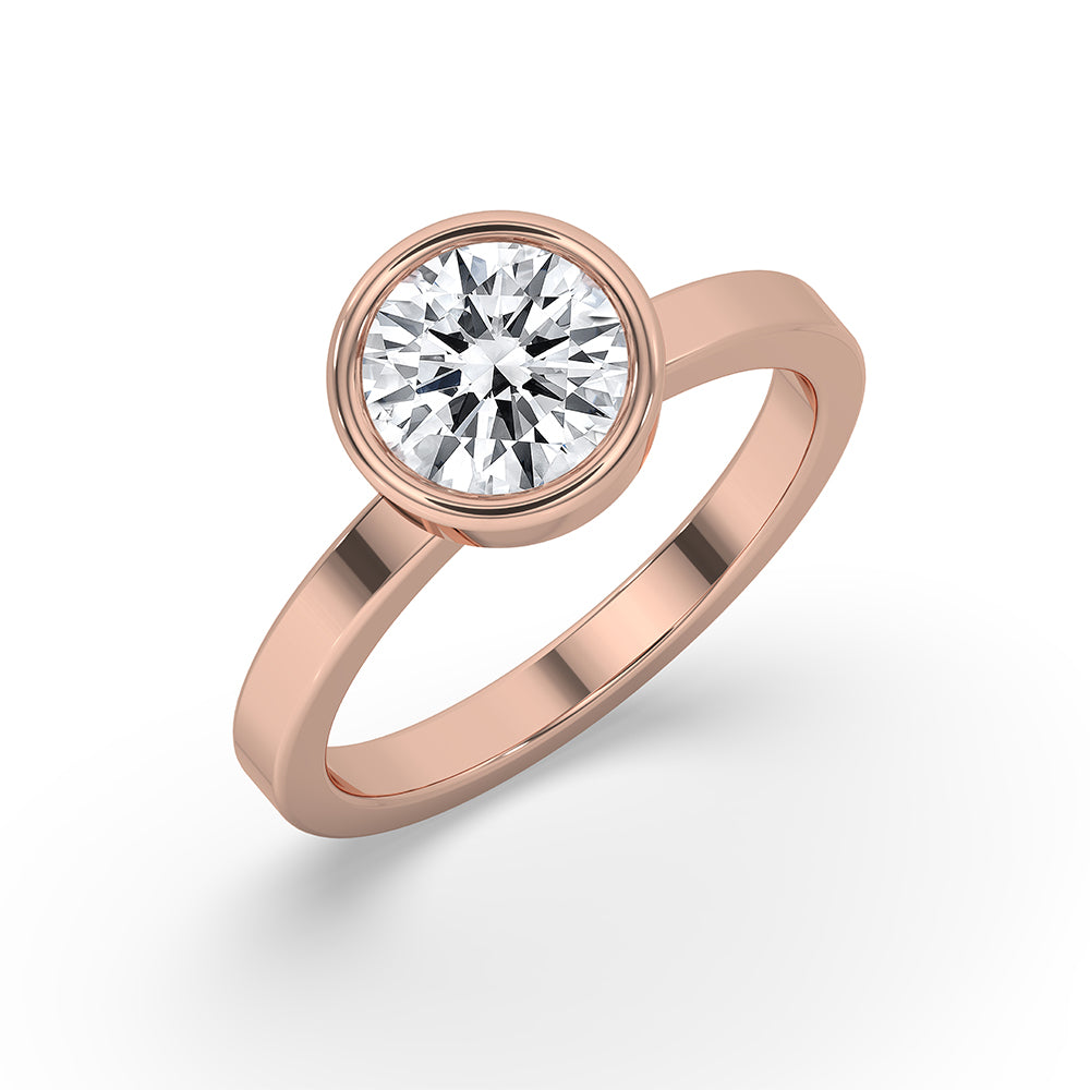 Rose gold engagement ring with a soft tone.
