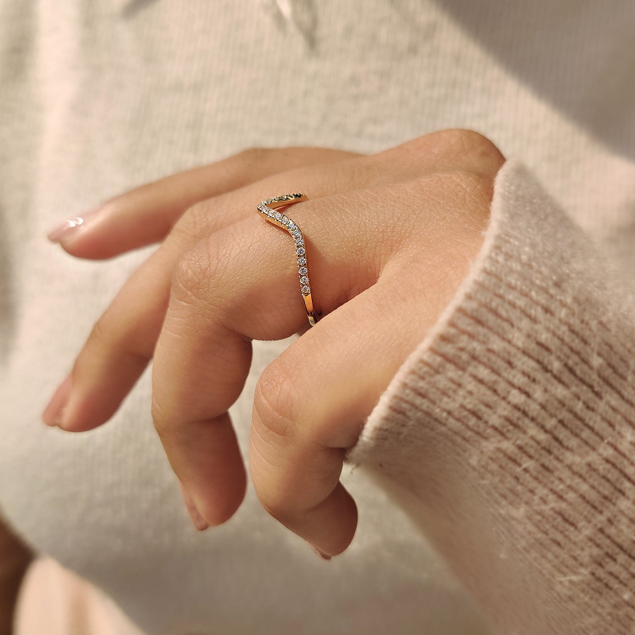 Classic gold chevron ring showcasing timeless appeal with a polished finish.
