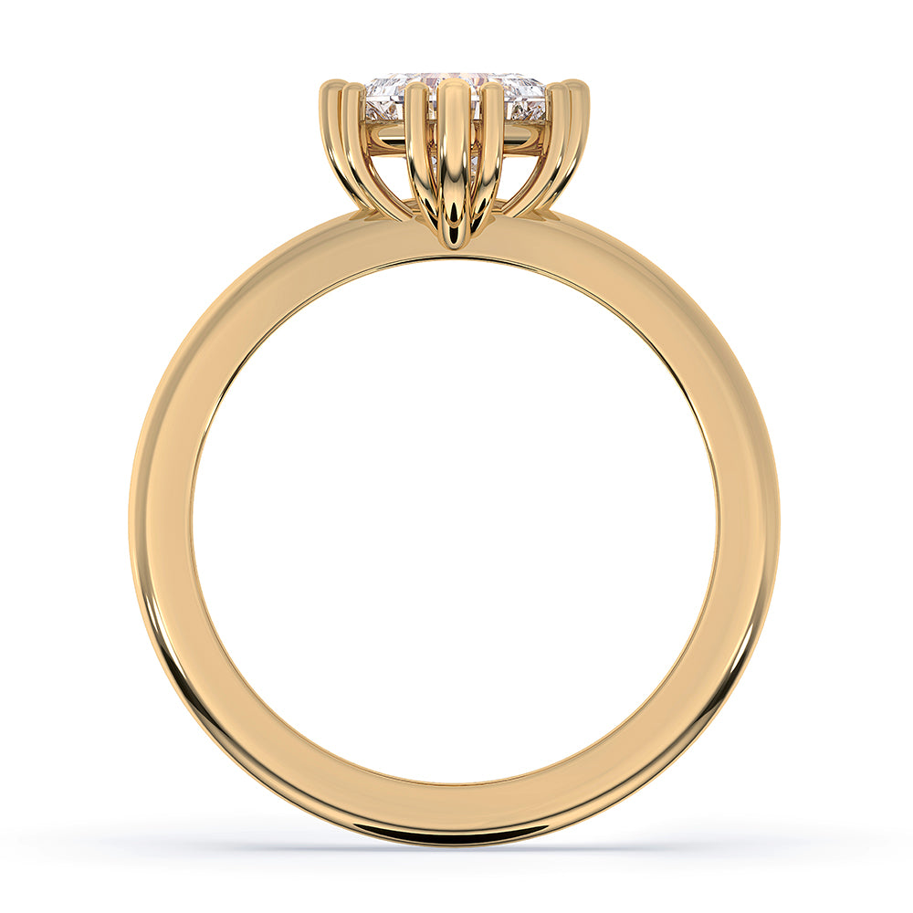 Elegant compass prong setting showcasing a Lab Grown Diamond in yellow gold.
