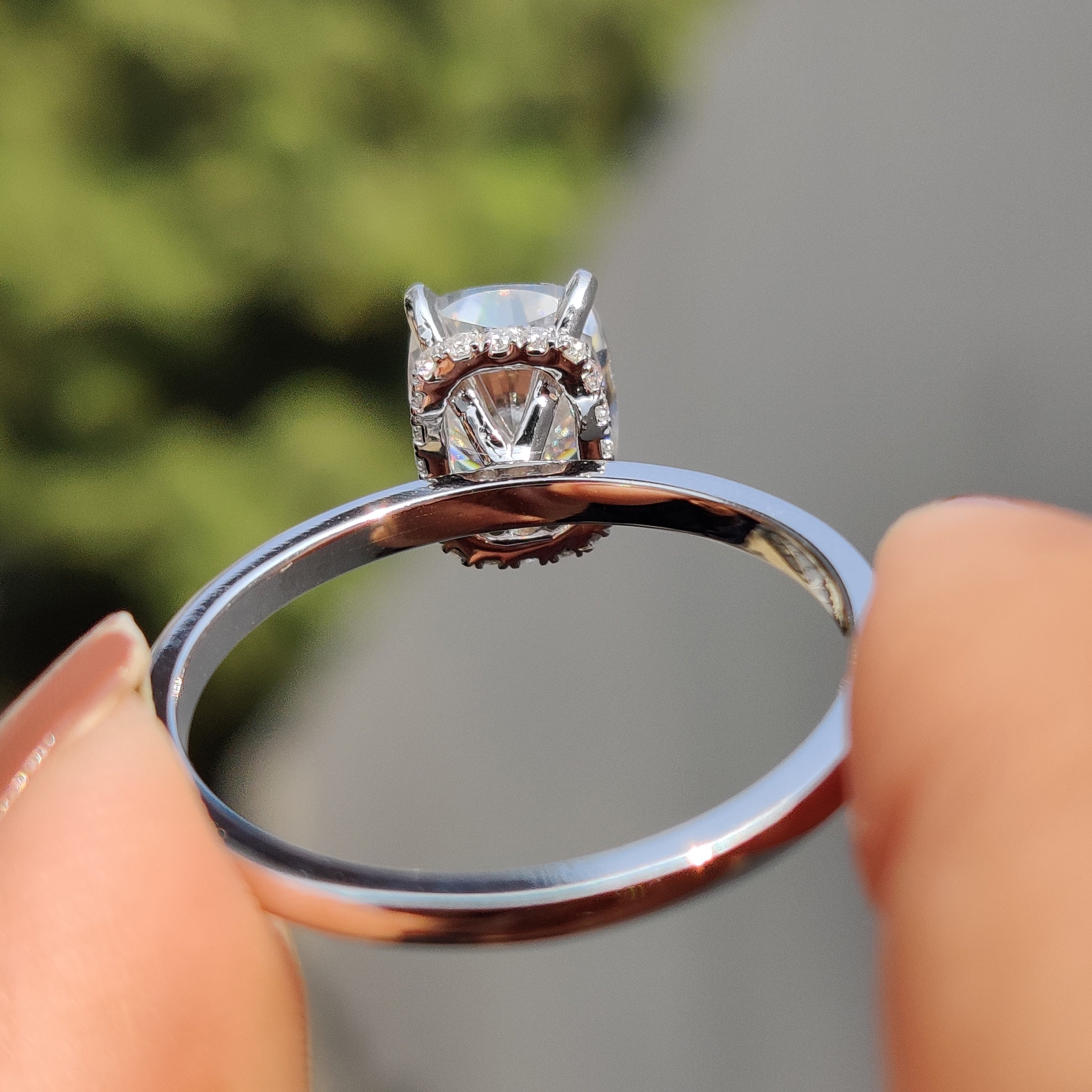 Cushion Cut Engagement Ring With Hidden Halo
