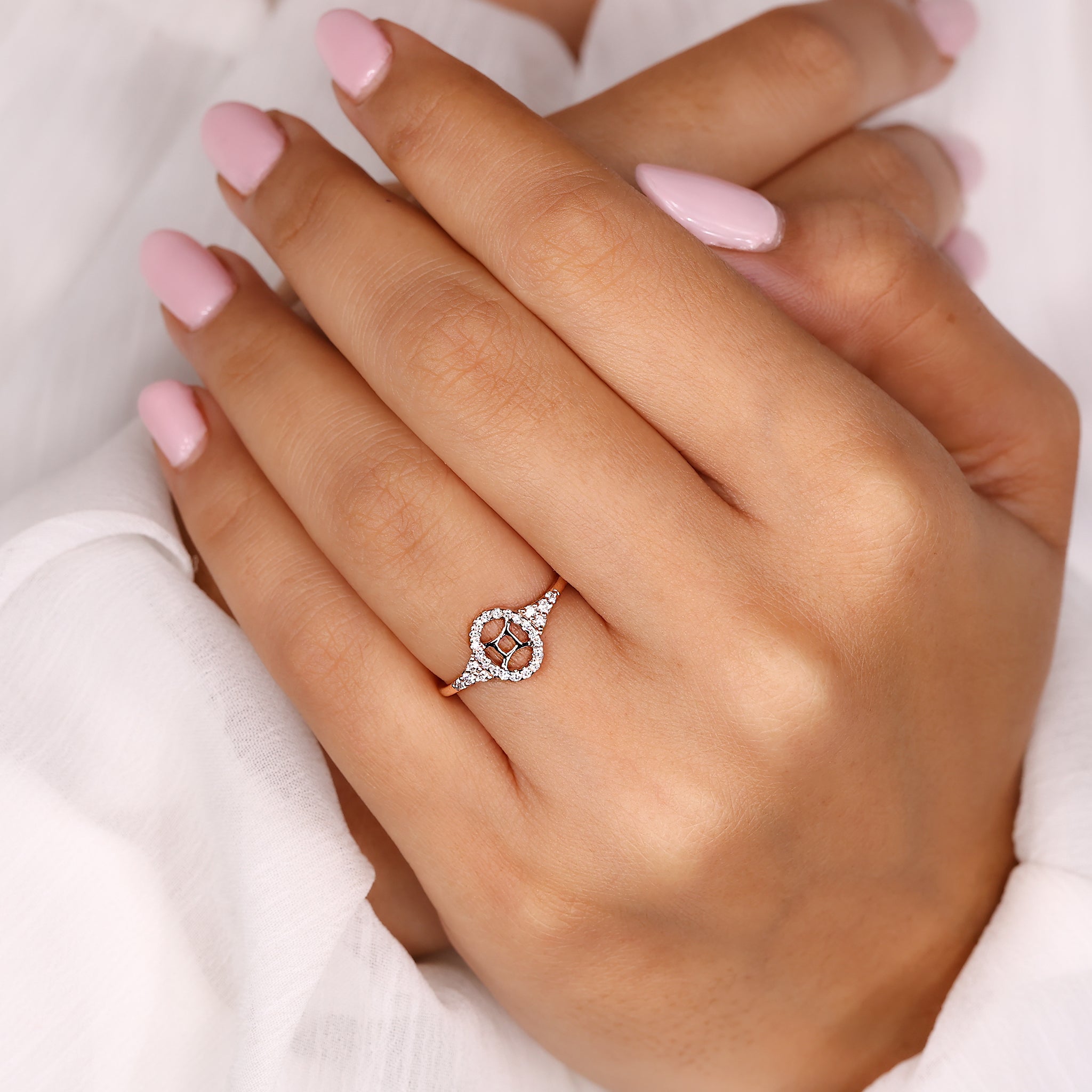 Buy engagement ring with Gemini zodiac sign and halo diamond setting.
