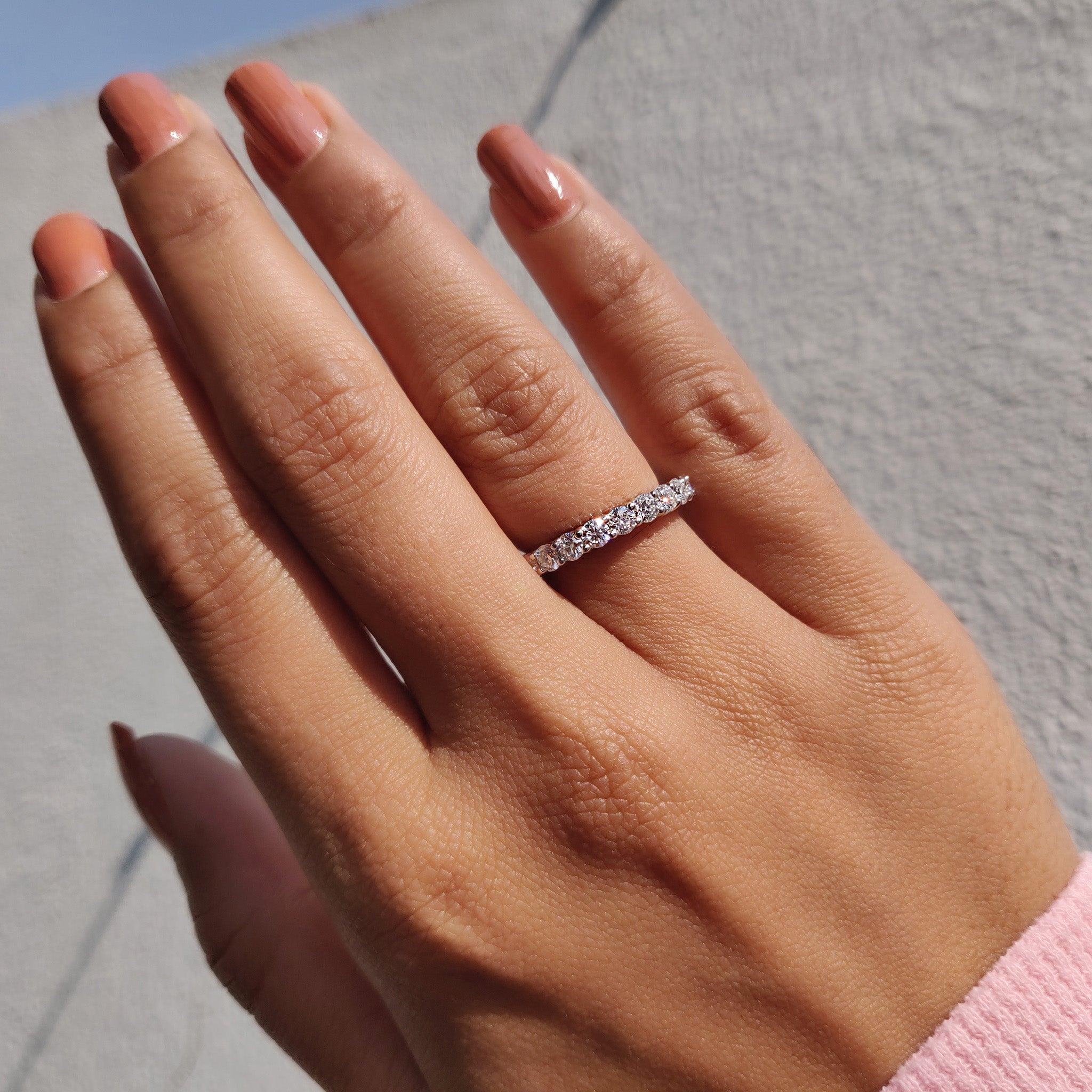 White gold moissanite band matches custom moissanite band.
