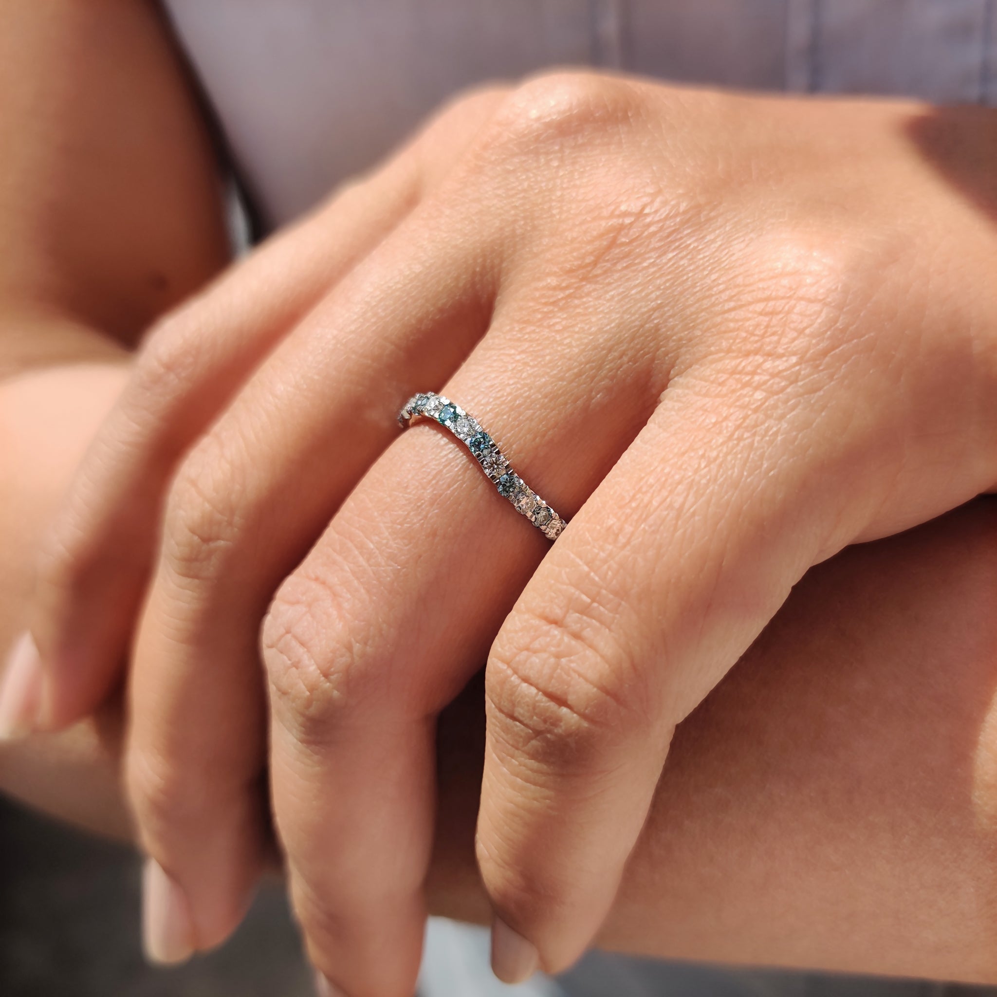 White gold band designed with precision and adorned with carat diamonds.