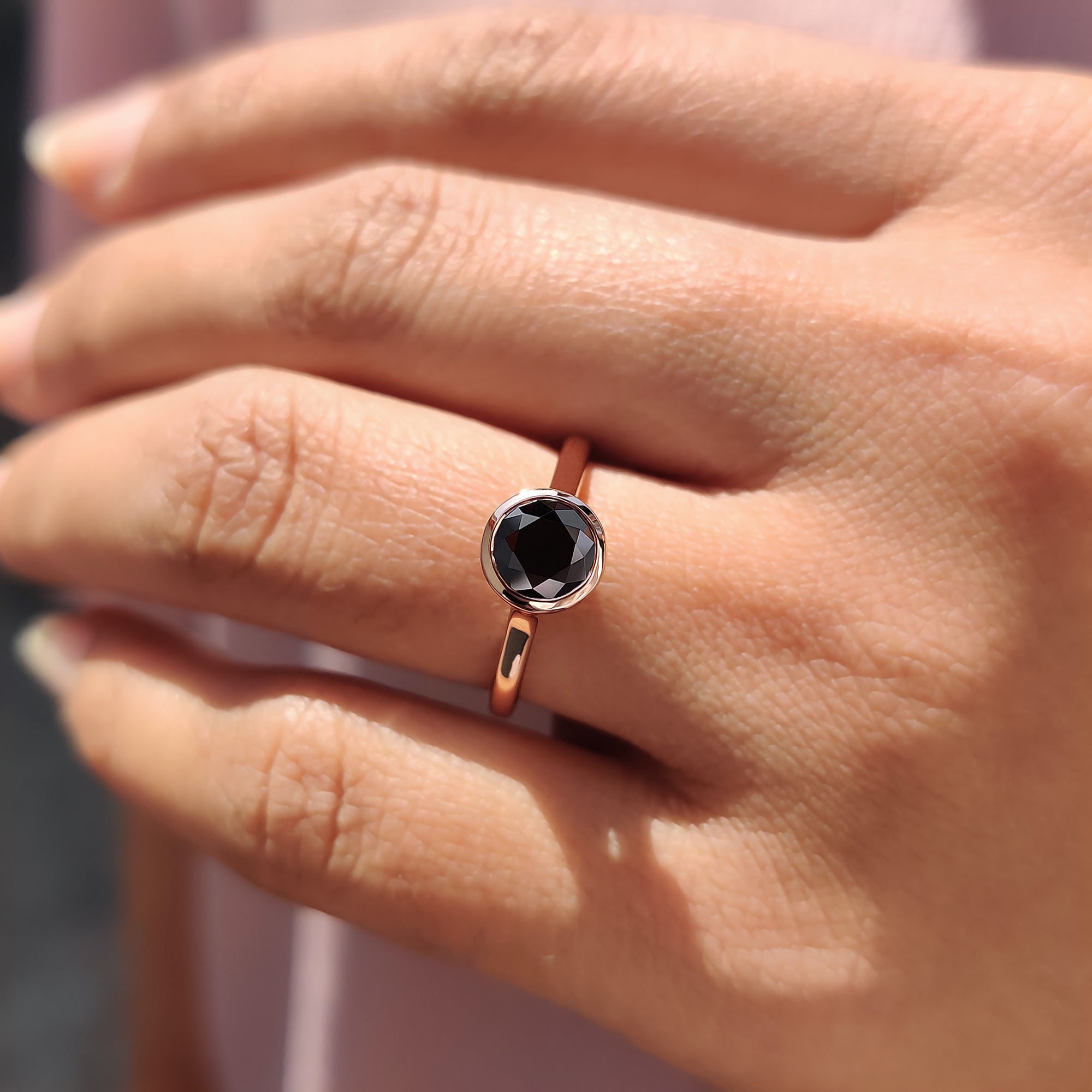 Best engagement ring with a solitaire design and unique black Moissanite.

