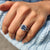 Cushion cut engagement ring with prong setting ring
