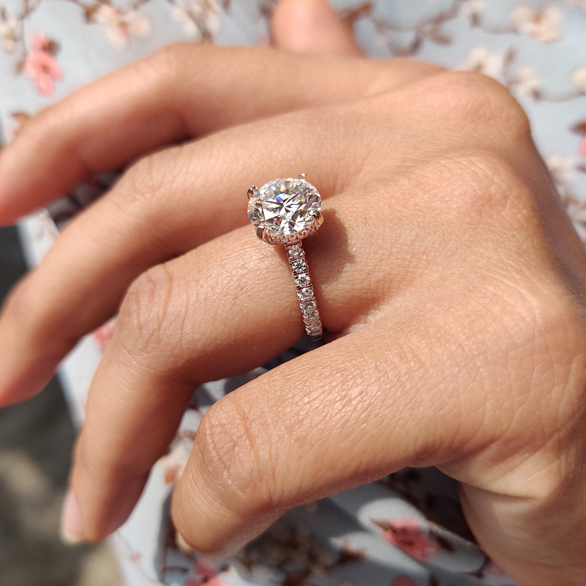 Pave round cut moissanite band creates shimmering soft brilliance.