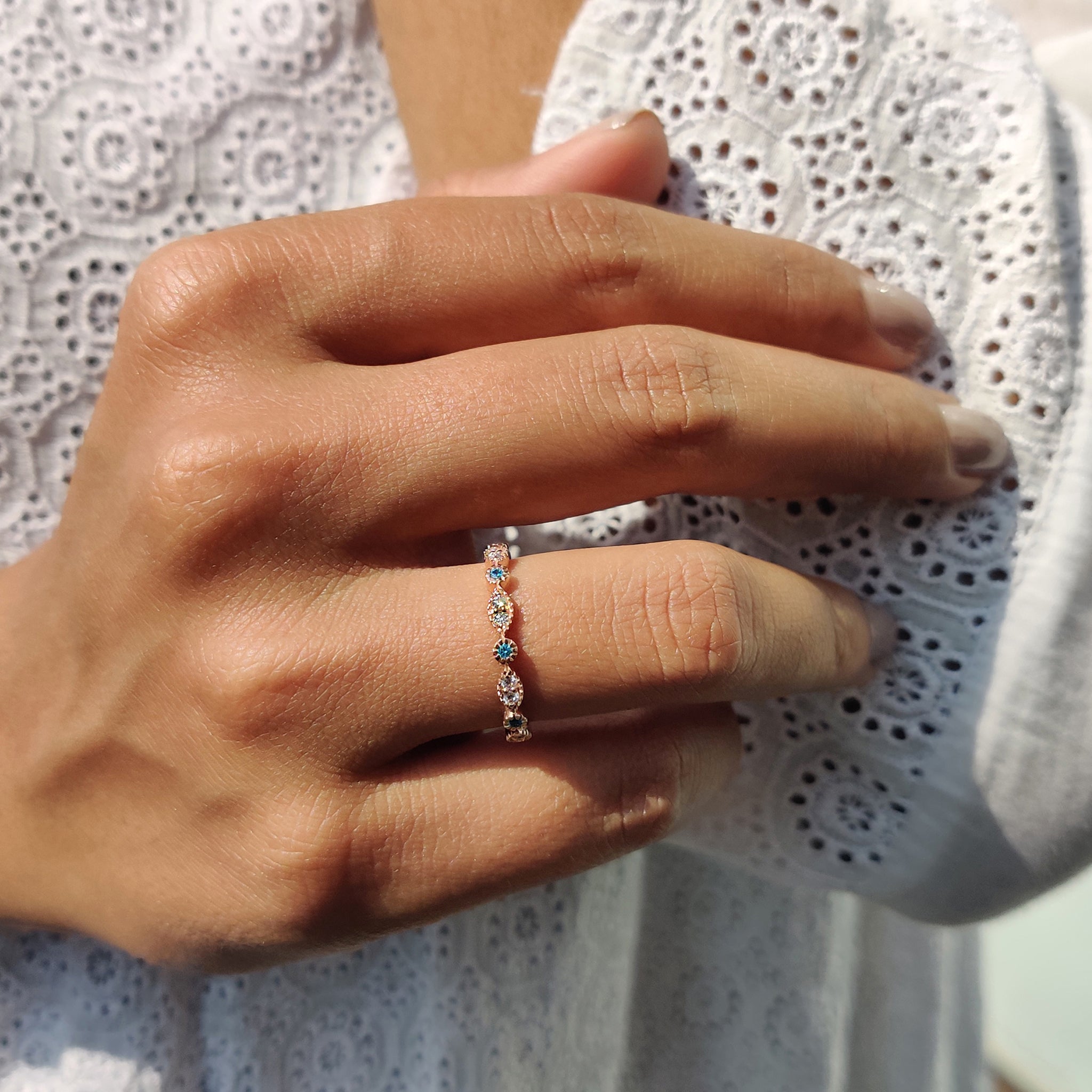 Moissanite wedding band with brilliant clarity.
