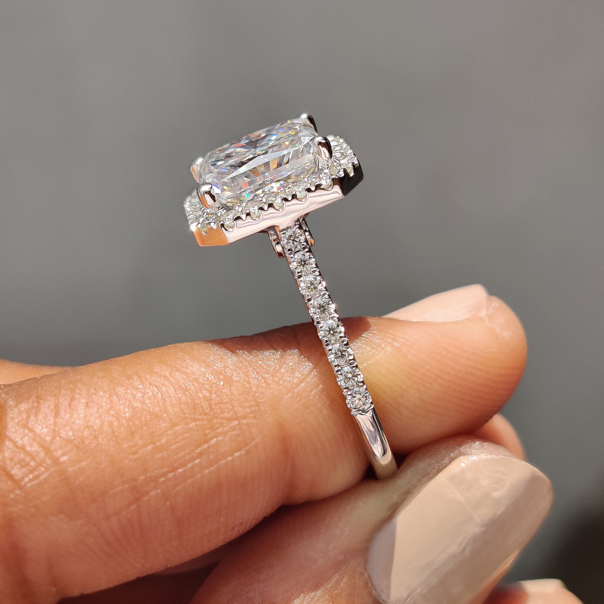 Pave cut moissanite band flows with smooth endless glow.