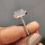 Pave cut moissanite band flows with smooth endless glow.