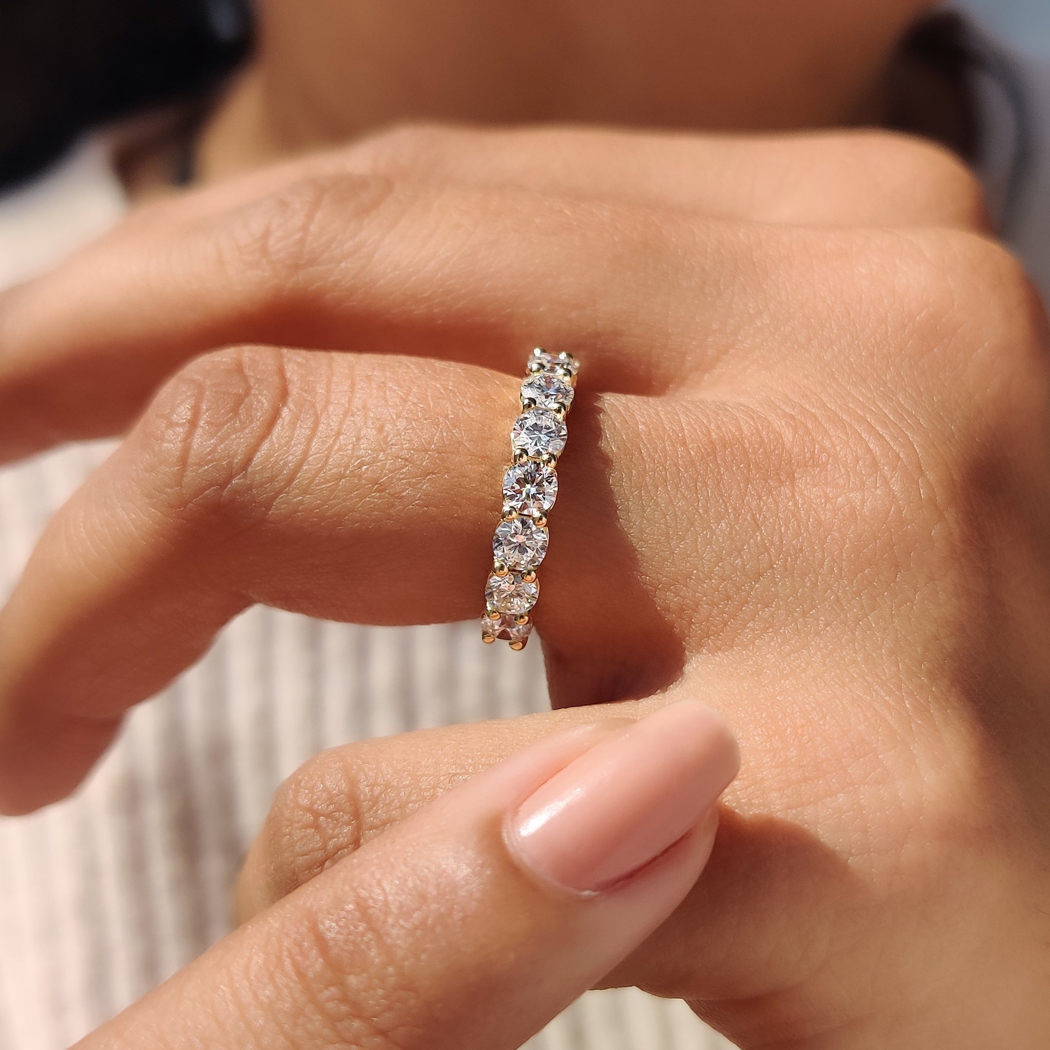 Lab grown diamond wedding band in a classic half eternity style.
