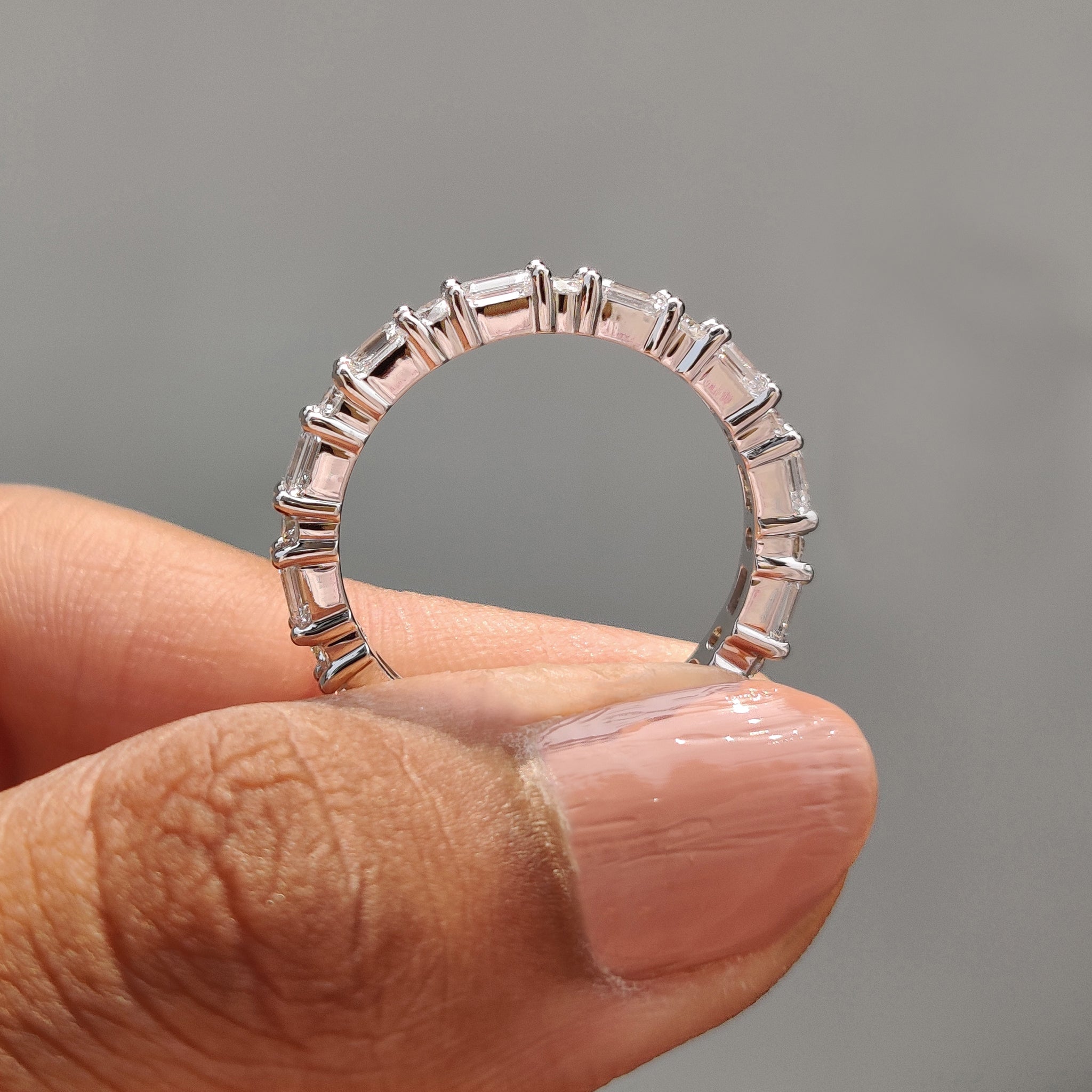 Handmade band featuring a full circle of diamonds.
