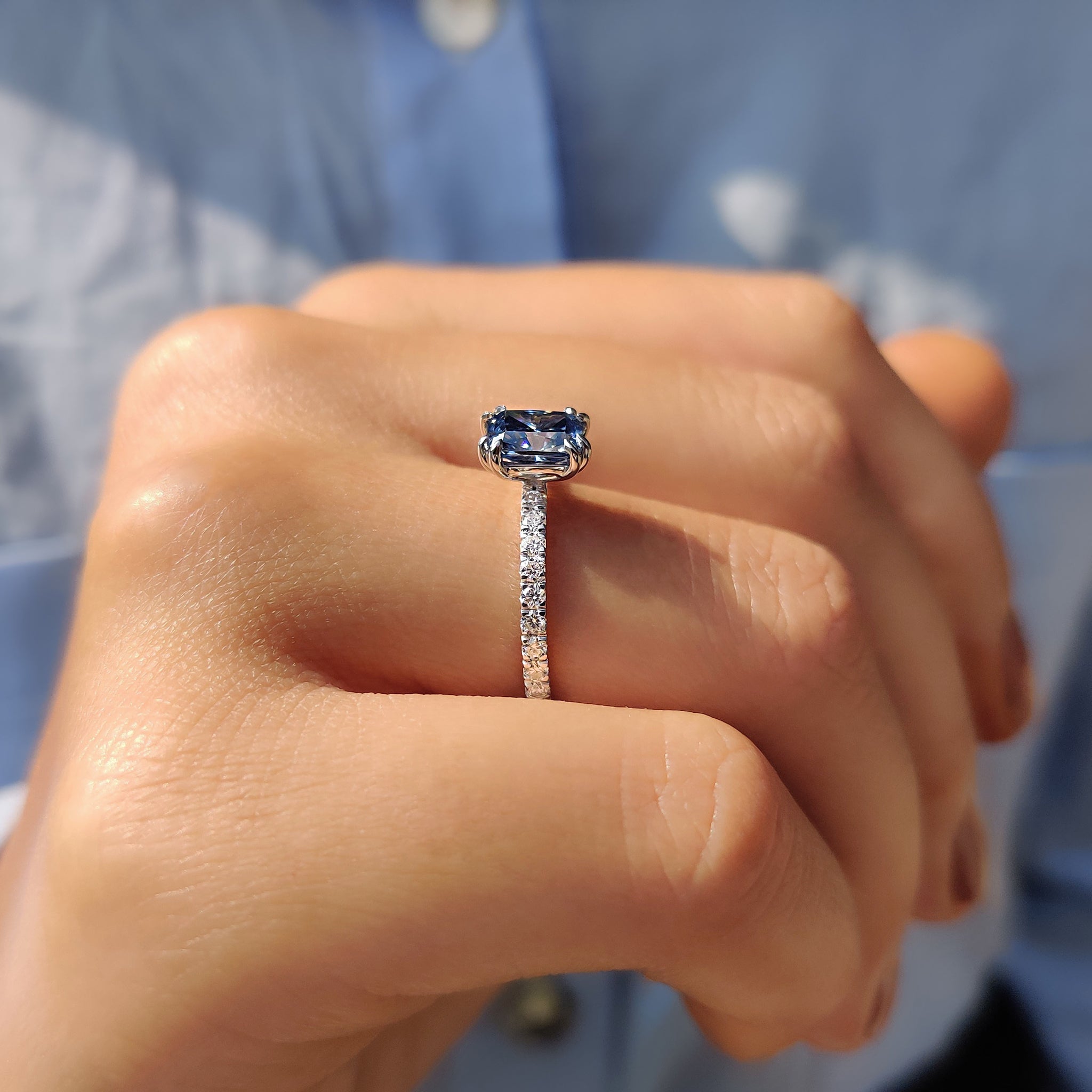 White gold moissanite ring with a clean look.

