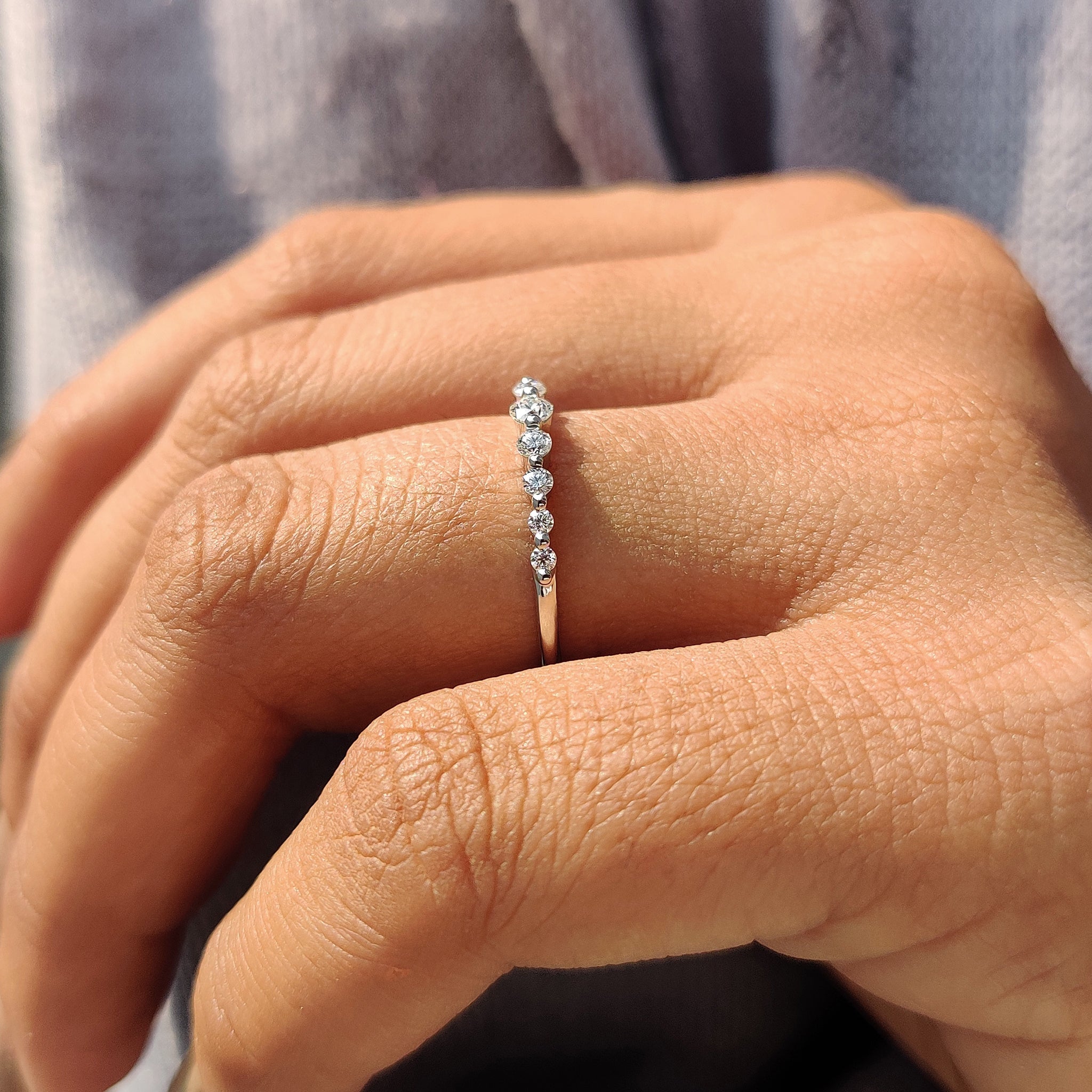 Half eternity band featuring lab grown diamonds.
