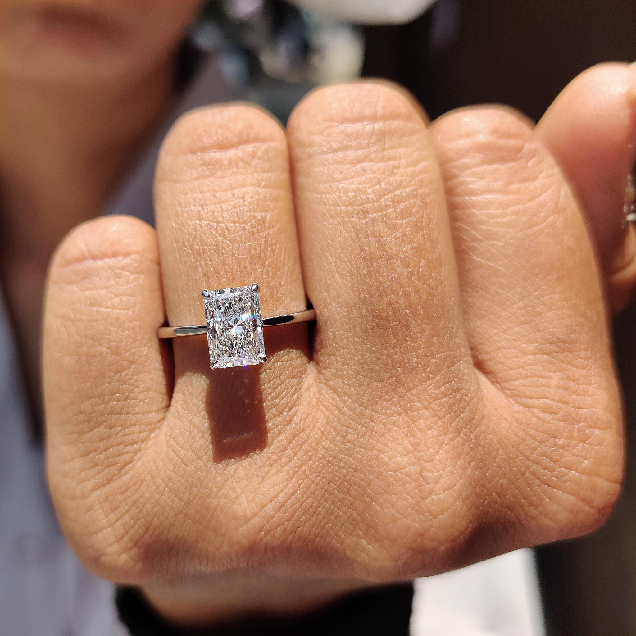 White gold diamond ring with a classic design.

