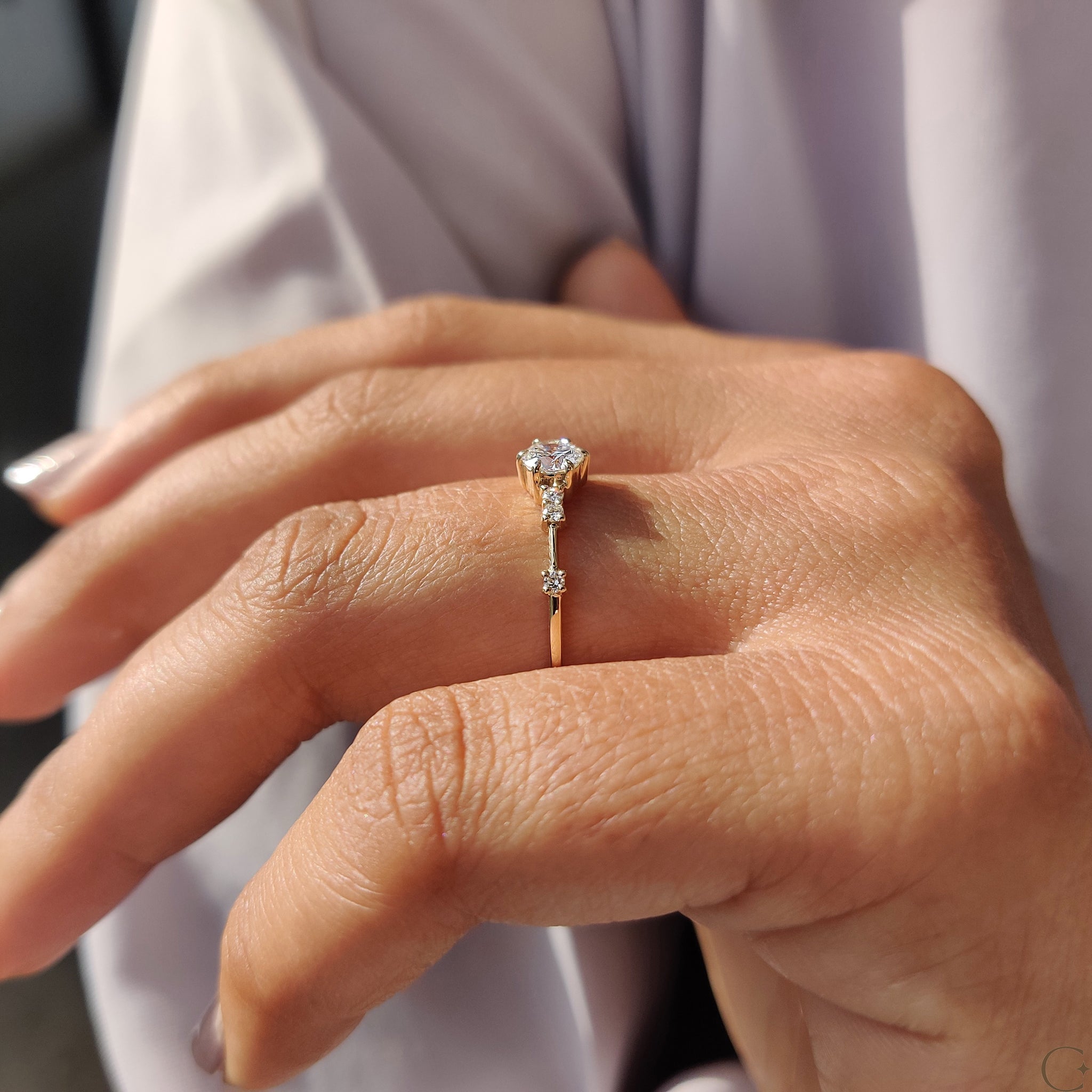 Yellow Gold Engagement Ring with a radiant round diamond.
