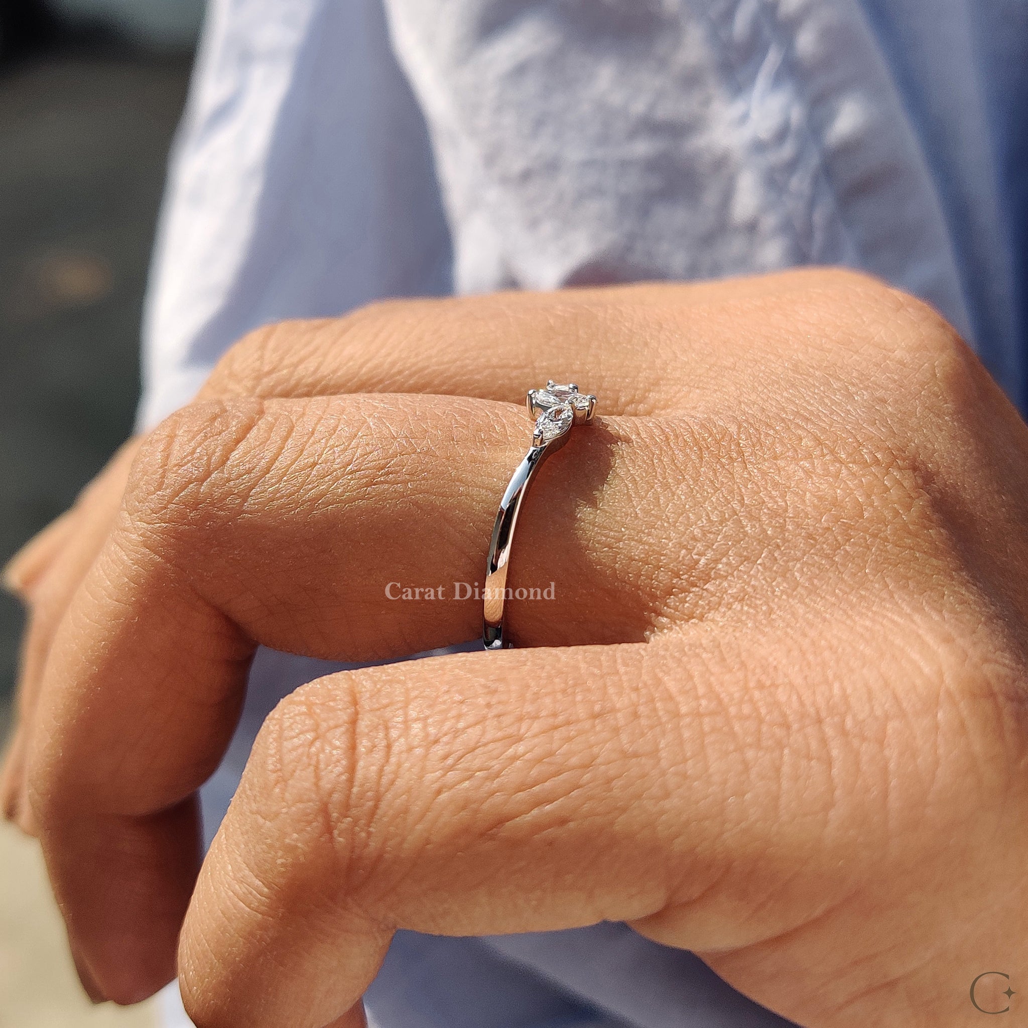 Diamond wedding band with handmade detailing from Carat Diamonds.

