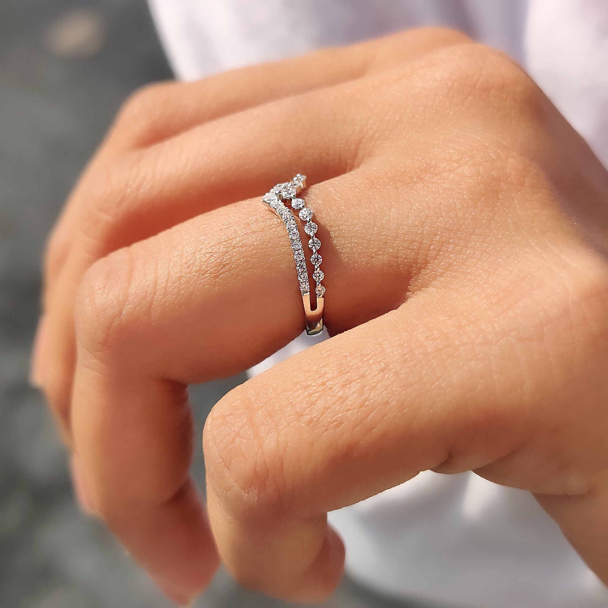 Double Row Wedding Band with shared prong diamonds for a bold look.

