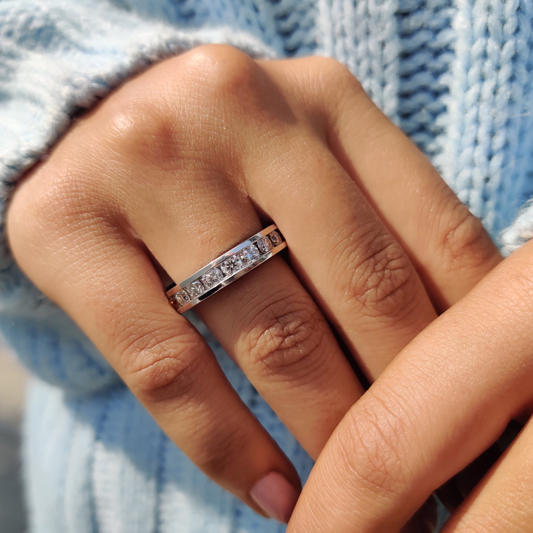 Buy moissanite band to add a unique touch to your wedding day ensemble.