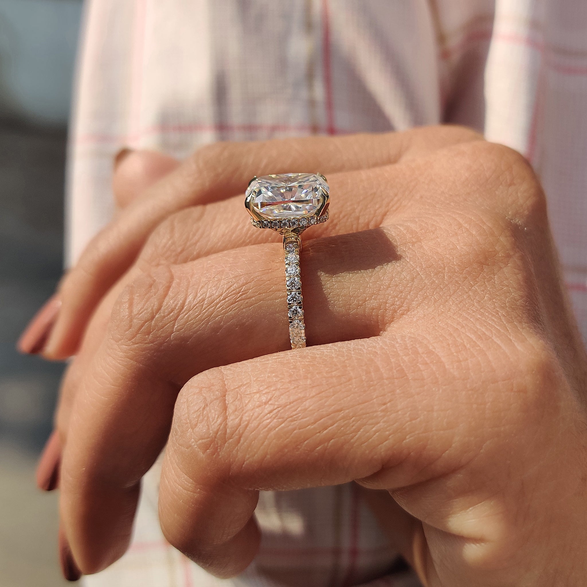 Pave setting engagement ring with intricate detailing.
