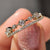 Double row wedding band with moissanite accents, offering a bold and modern design.