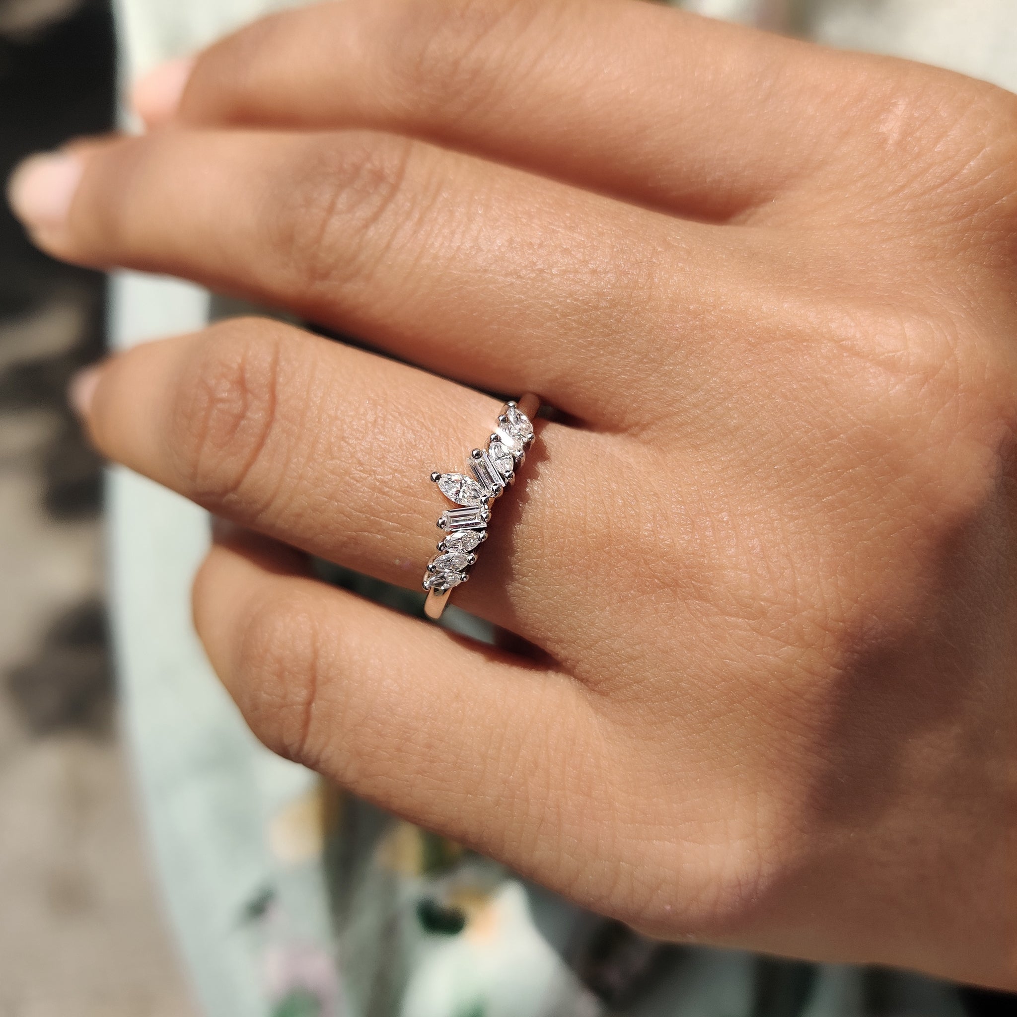 Elegant tiara wedding band designed to crown your finger with shimmering brilliance.