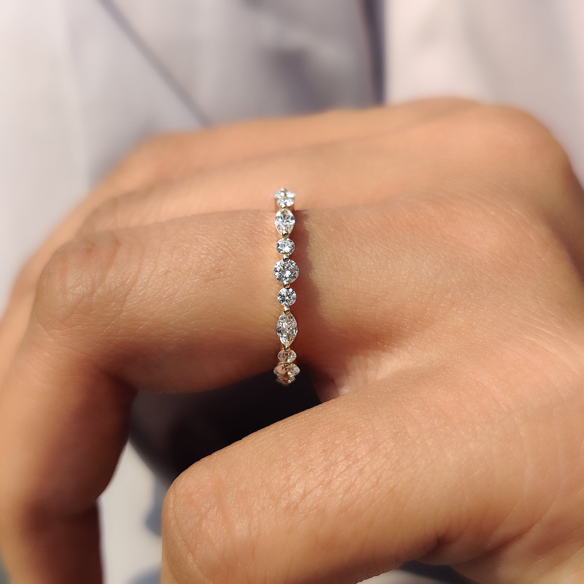 Buy wedding band made with lab grown diamonds.