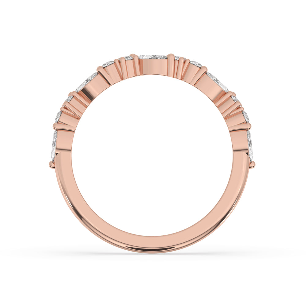 Marquise and round diamond band crafted with IGI certified diamonds.