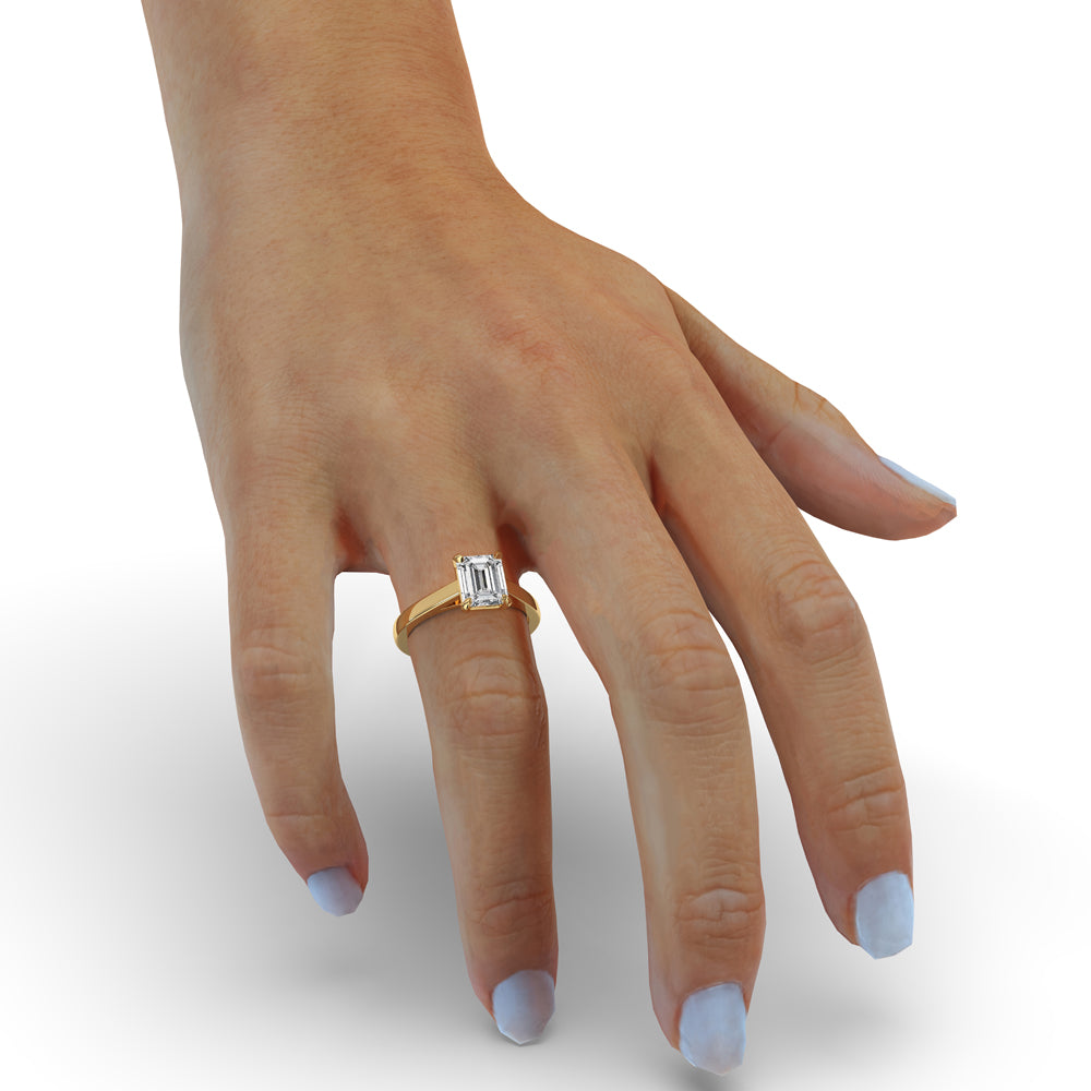 Emerald cut engagement ring diamond with a cathedral setting, perfect for an elegant style.
