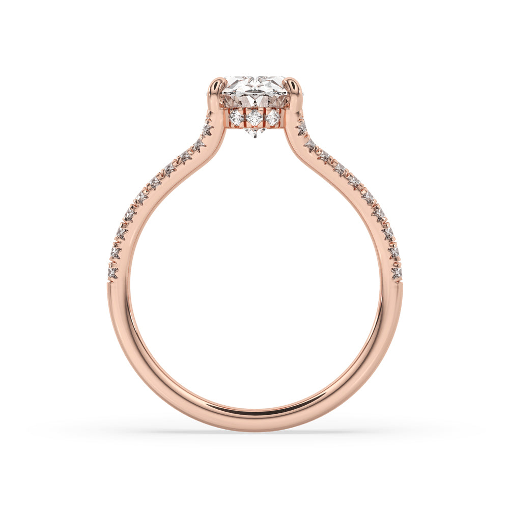 Hidden halo engagement ring oval design with claw setting and pave diamond band for added sparkle.