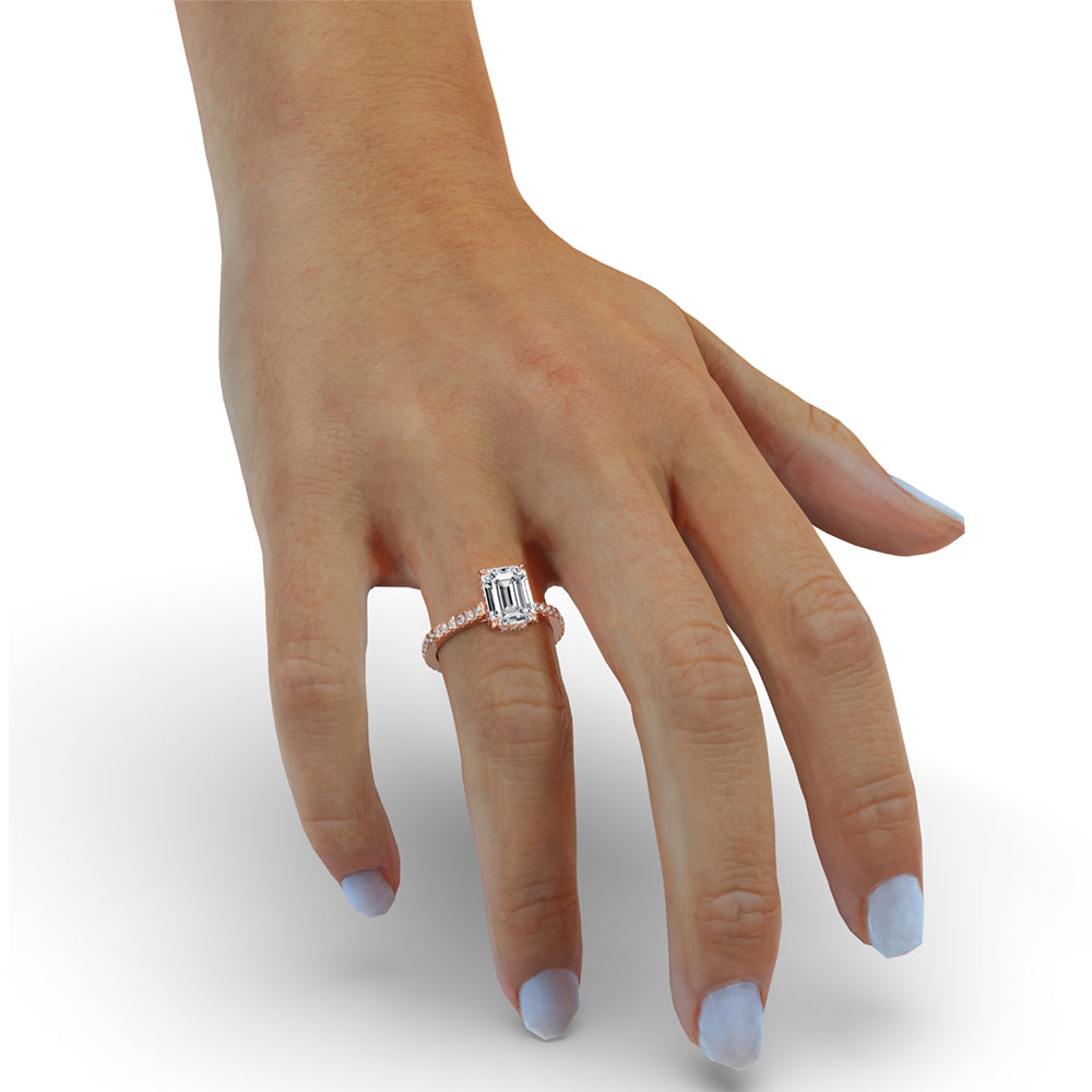 Beautiful Emerald Cut Pave Engagement Ring with pave band ring, adorned with a hidden halo diamond ring and claw prongs for added sparkle.
