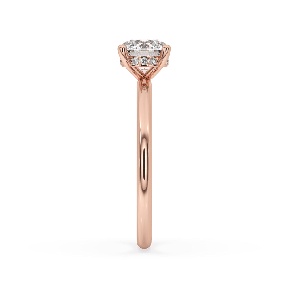Hidden halo diamond ring with 4 prong round engagement ring setting, round brilliant cut diamond, IGI certified.