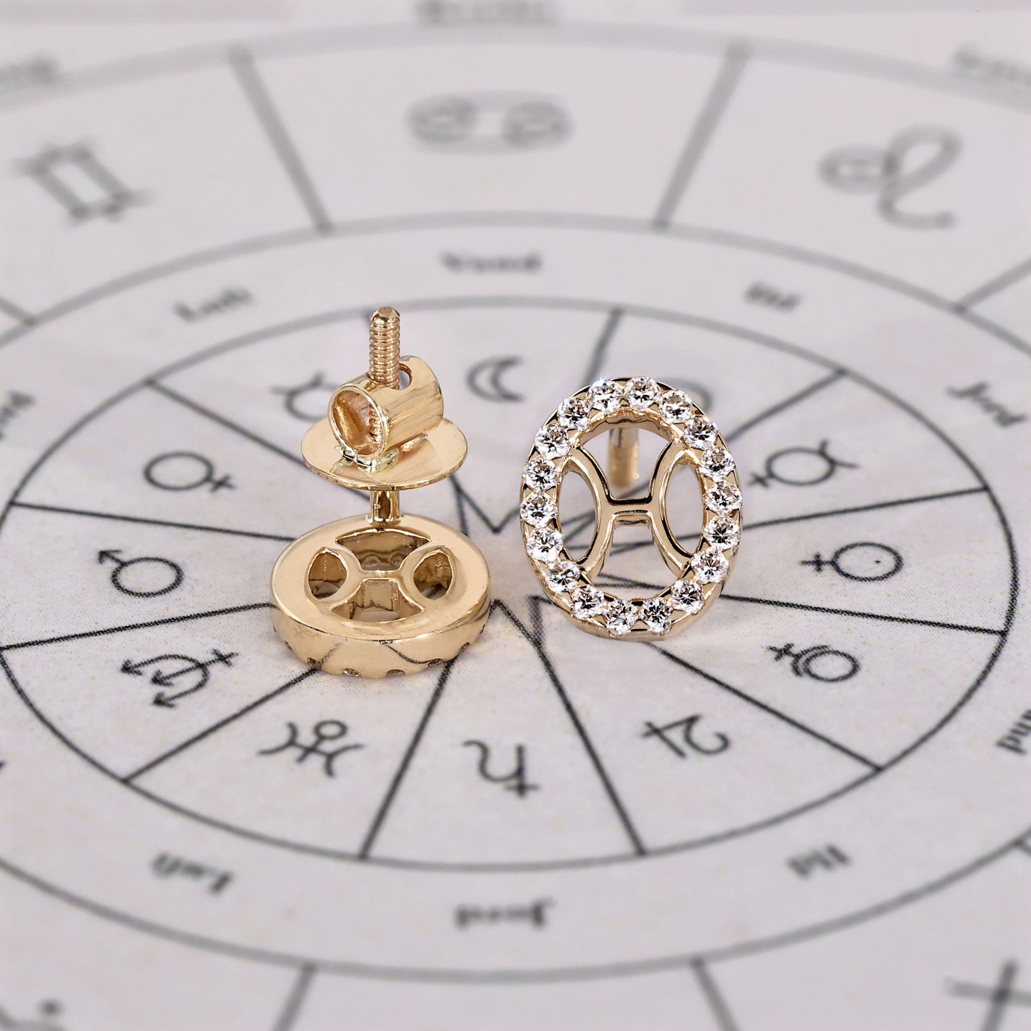 Handmade zodiac earrings for Pisces with halo diamond studs.
