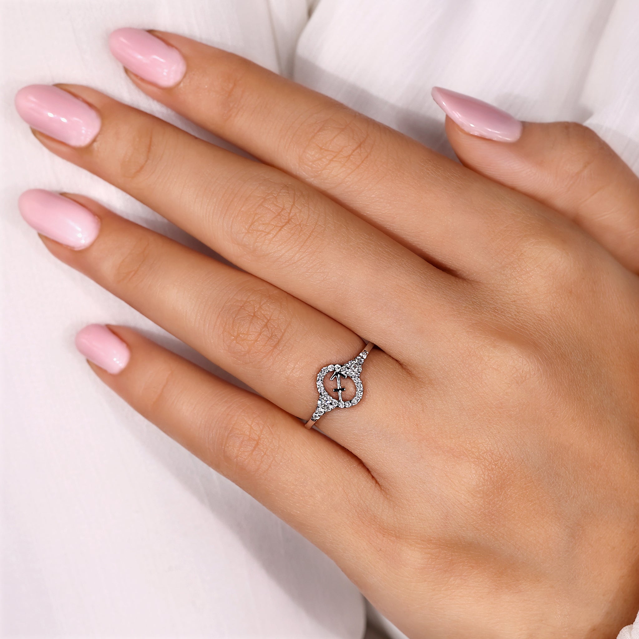 Astrology ring featuring Sagittarius zodiac sign and Lab Grown Diamond center.
