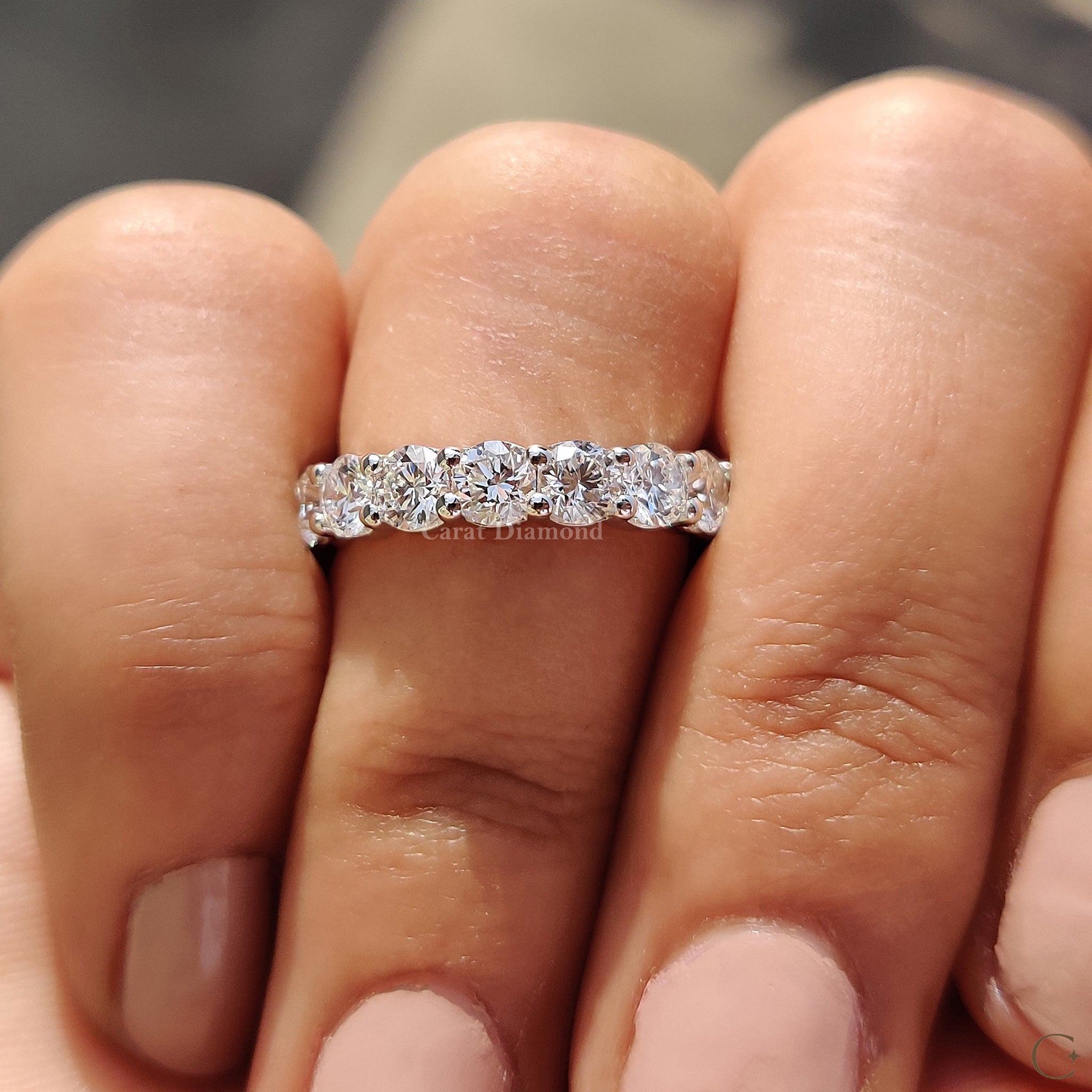 IGI certified ring shown with grading report beside it.
