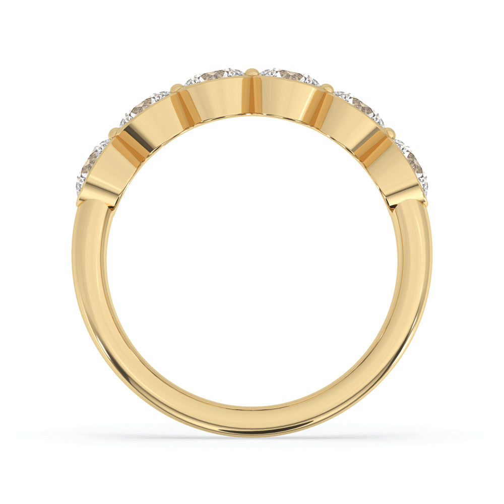 Buy wedding band with bezel set diamonds in a yellow gold band style.
