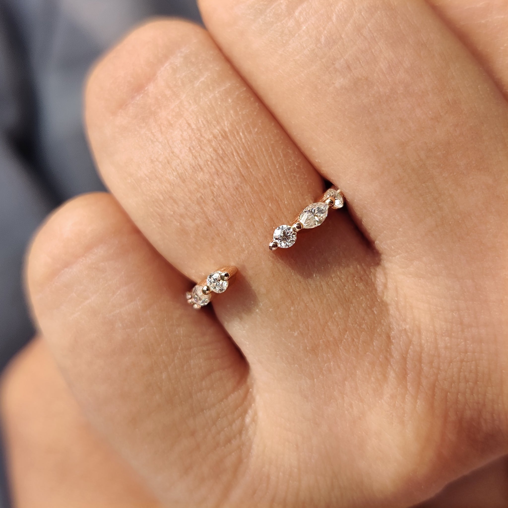Rose gold wedding band with a floating bubble prong band and open gap wedding band.