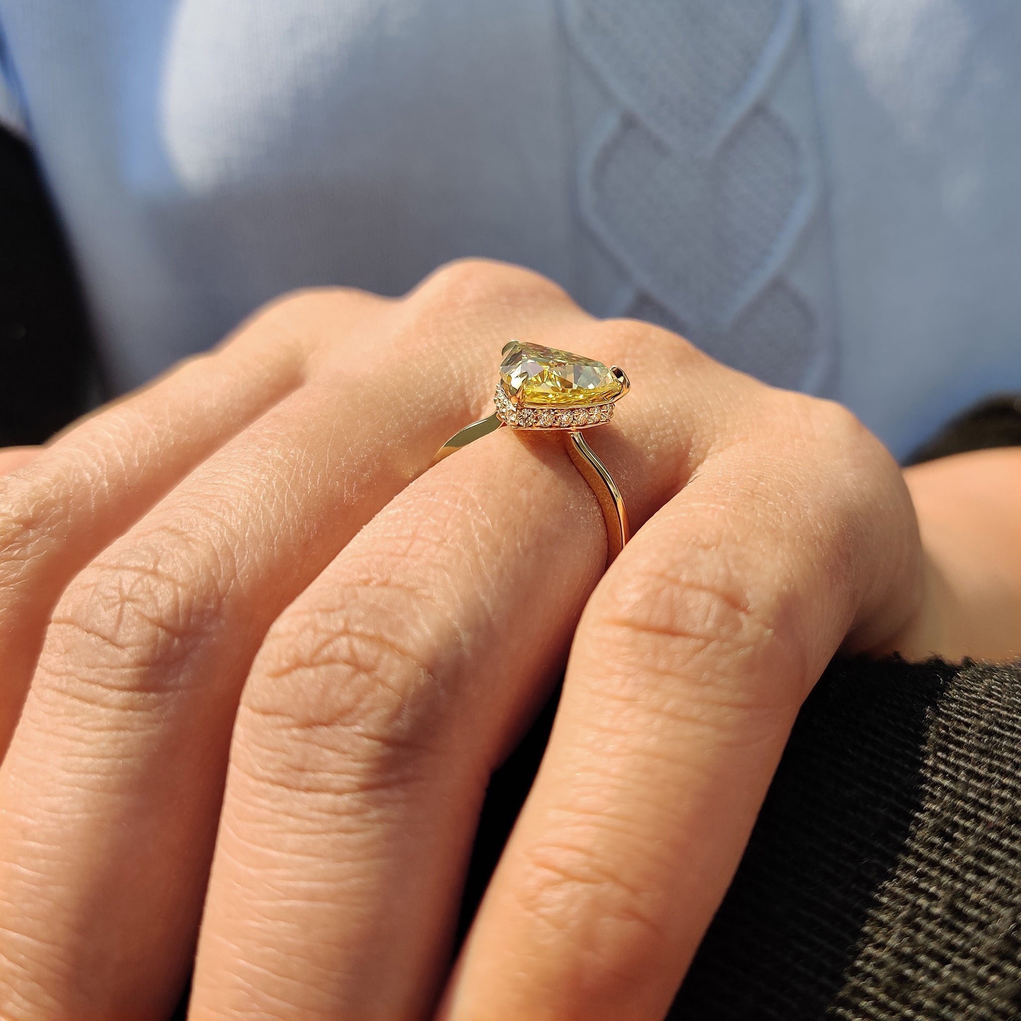 Moissanite engagement ring with round cut hidden halo for a refined and timeless look.