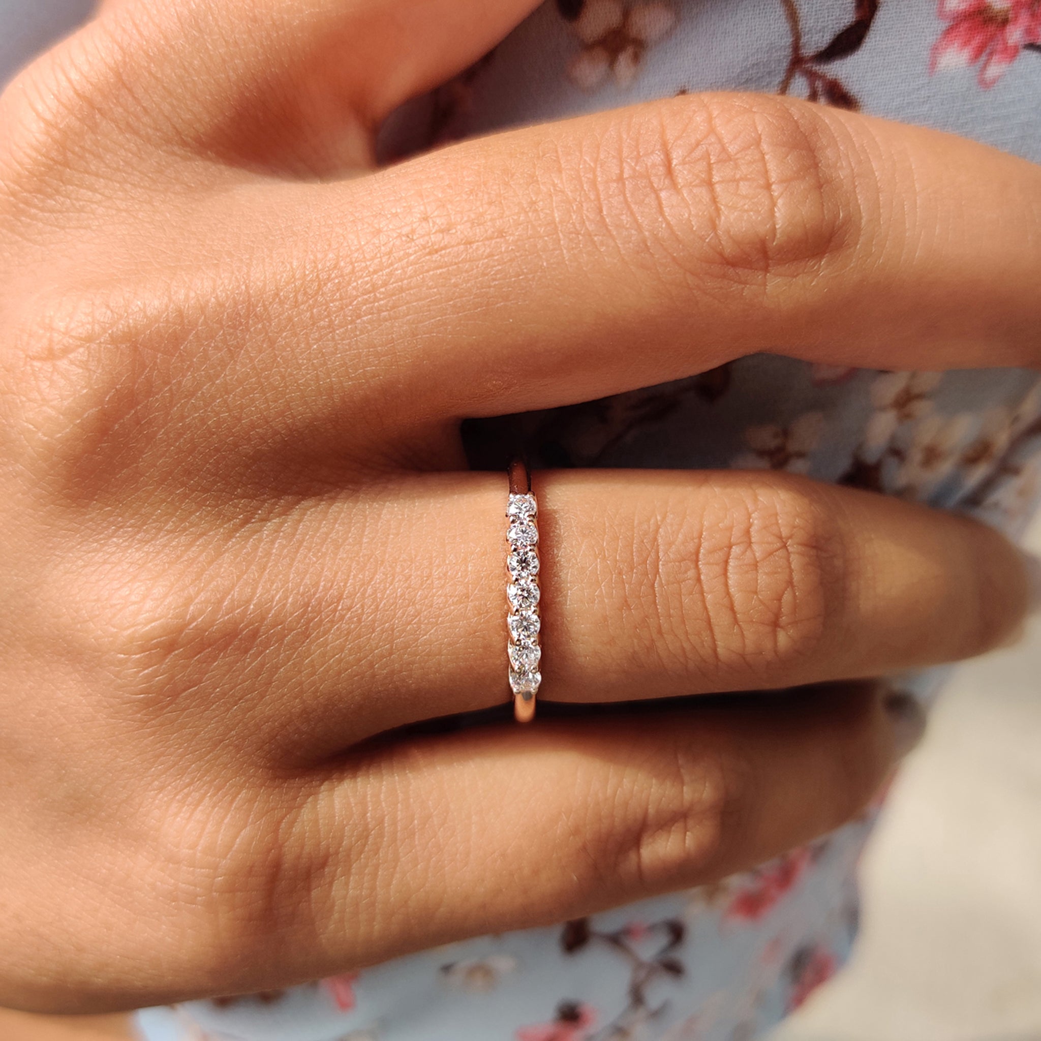 Carat diamonds band with round moissanite stones, perfect for a stylish wedding ring.